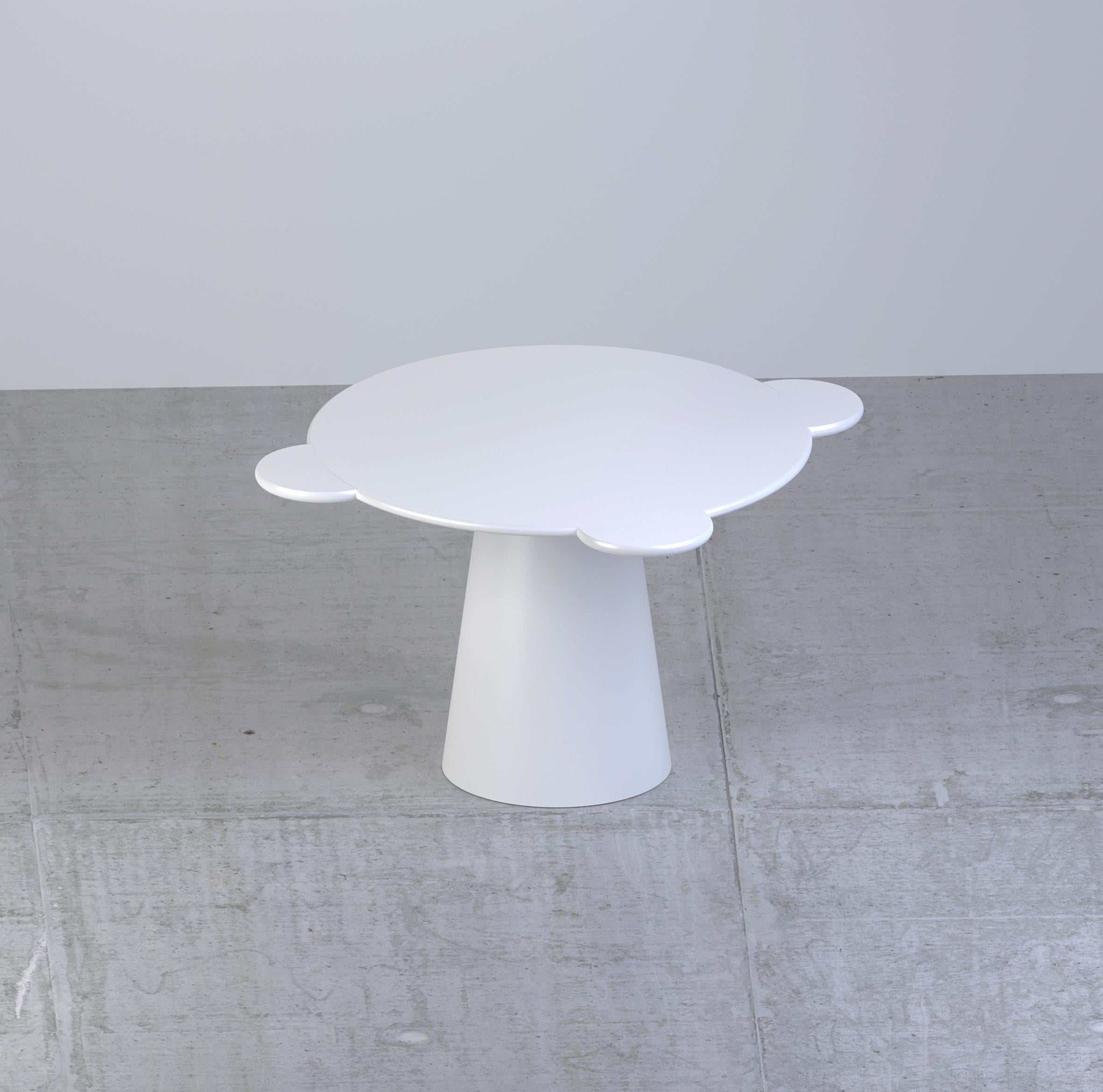 Donald is a multifunctional table with a sculpturally cosmic aspect and colorful circular shapes.

The sculptural silhouette has a wooden structure composed of a truncated cone that supports a round top adorned with three semi-circular flaps,