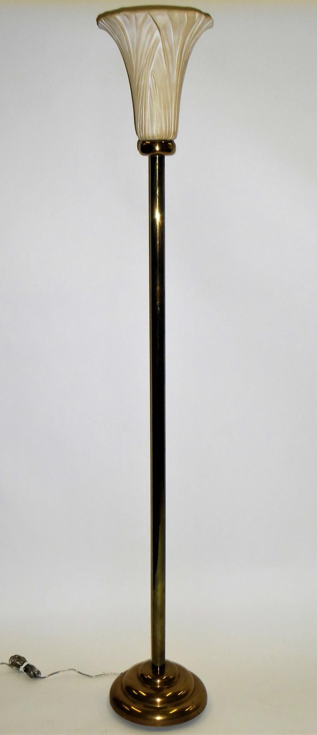 Exquisite 1983 Chapman brass and ceramic torchiere floor lamp having a decidedly Art Deco inspiration with it's brass stepped donut socle base and brass stem rising to a ceramic lily or lotus form globe. A bit Egyptian as well in influence.