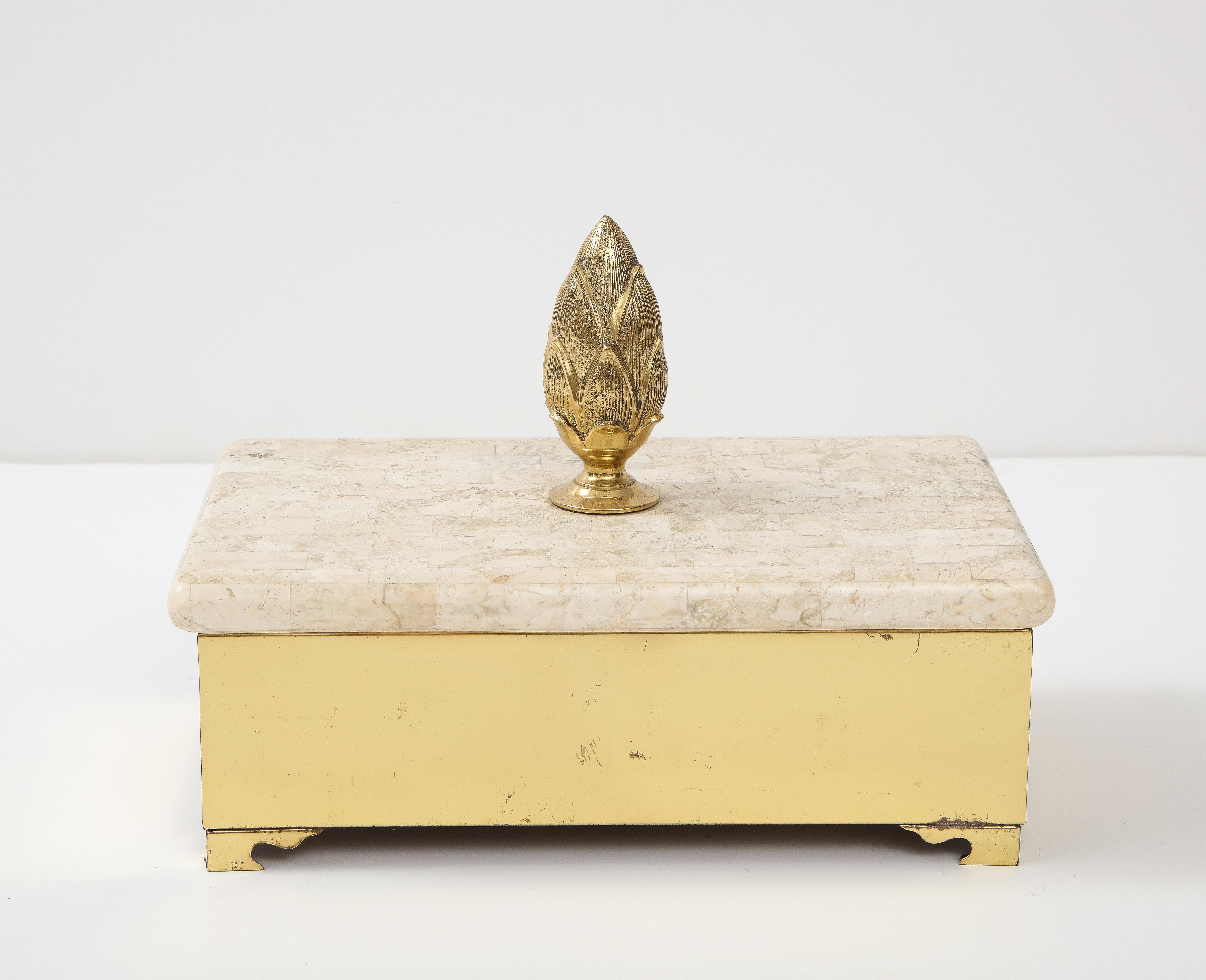 Glamorous 1980s brass letter box with a tessalated travertine lid. Lid adorned with an oversized stylized brass artichoke finial.