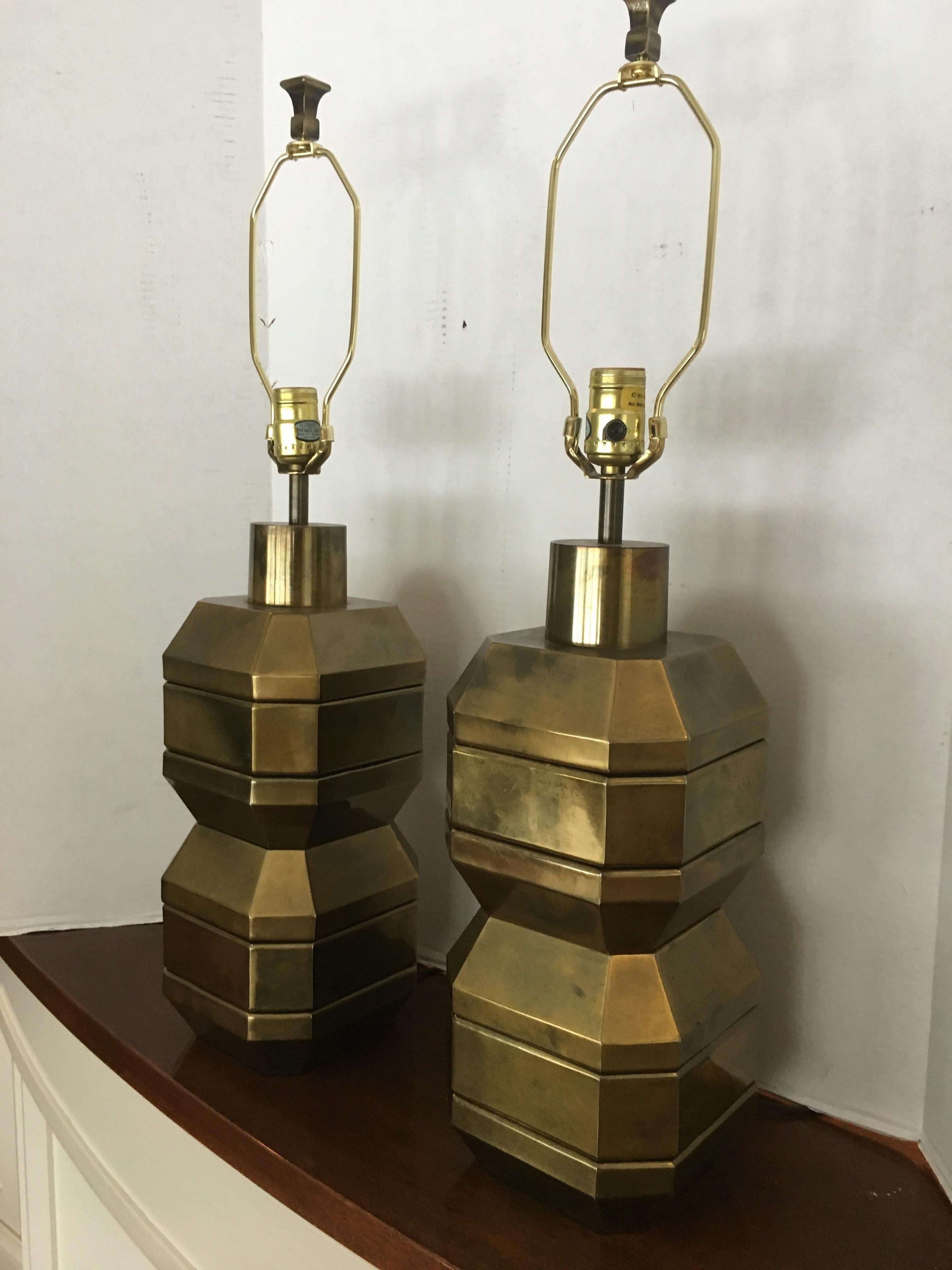 A pair of Chapman rare chunky brass lamps.