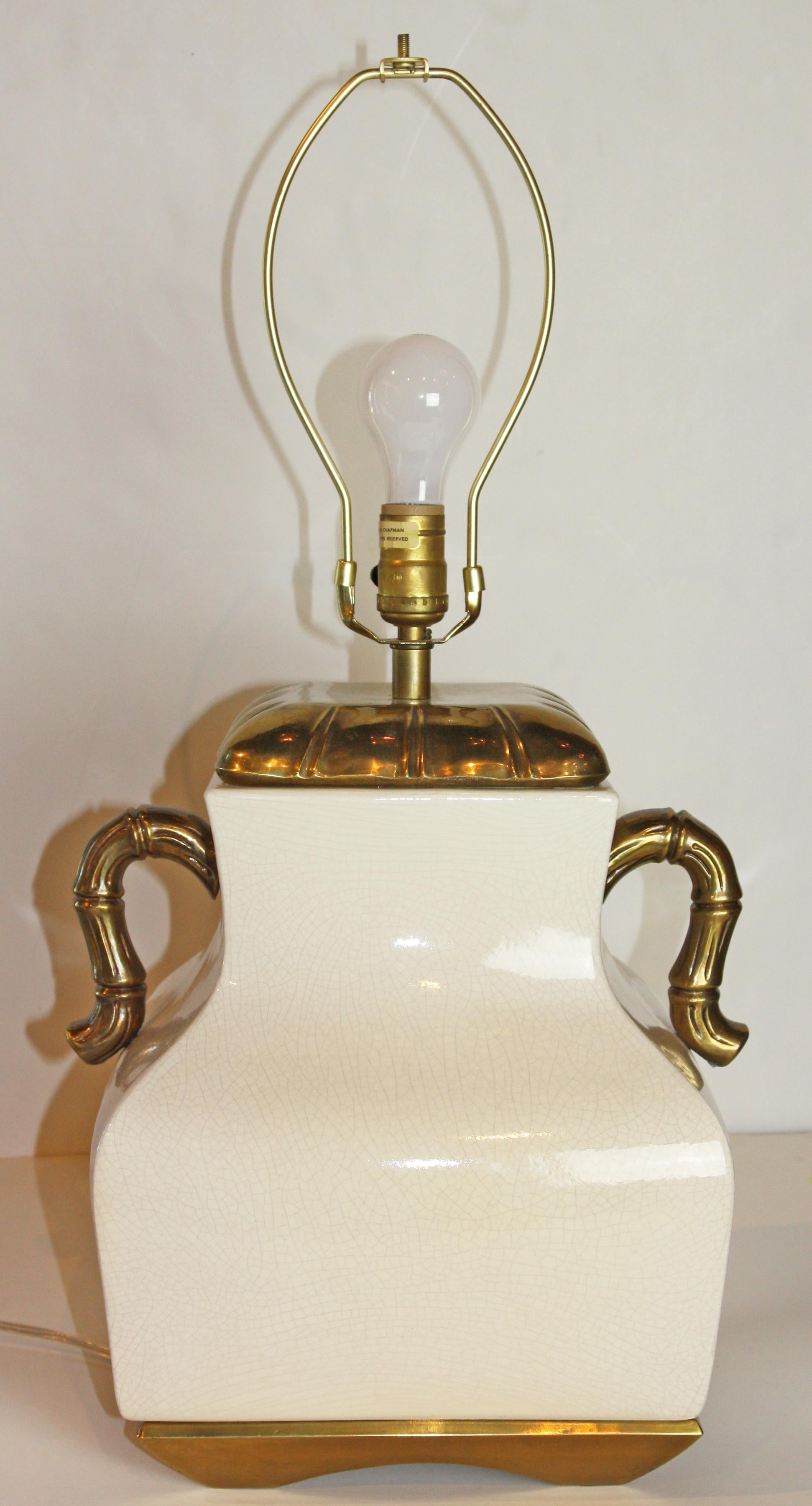 A vintage Chapman, double-handled, urn lamp in a white crackle glaze. Included is a large, unique, hexagonal shade (diameter 16.5