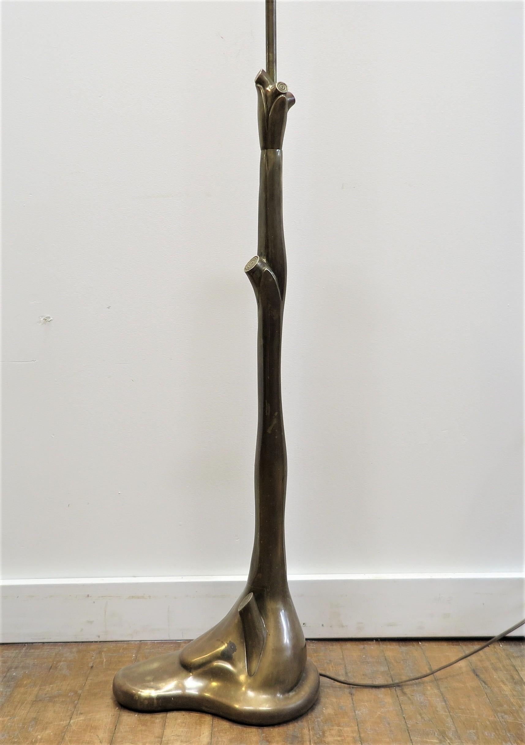 Chapman Brass floor lamp Faux Bois.  Rare Chapman Faux Bois Floor lamp.  Beautiful design reminiscent of Art Nouveau style.  Articulating up, down with 360 rotation movement of the pole.  Entire piece is made of solid brass beautifully patinated.  