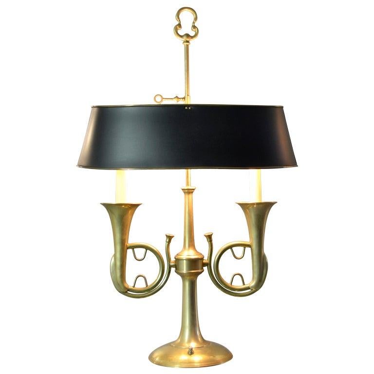With brass lined tole shades and double French horn design, these lamps has two small candle bulbs as well as a two standard bulb lamp head. Switch allows low candle bulbs only, standard bulbs only, both together, and all off. Expertly crafted by