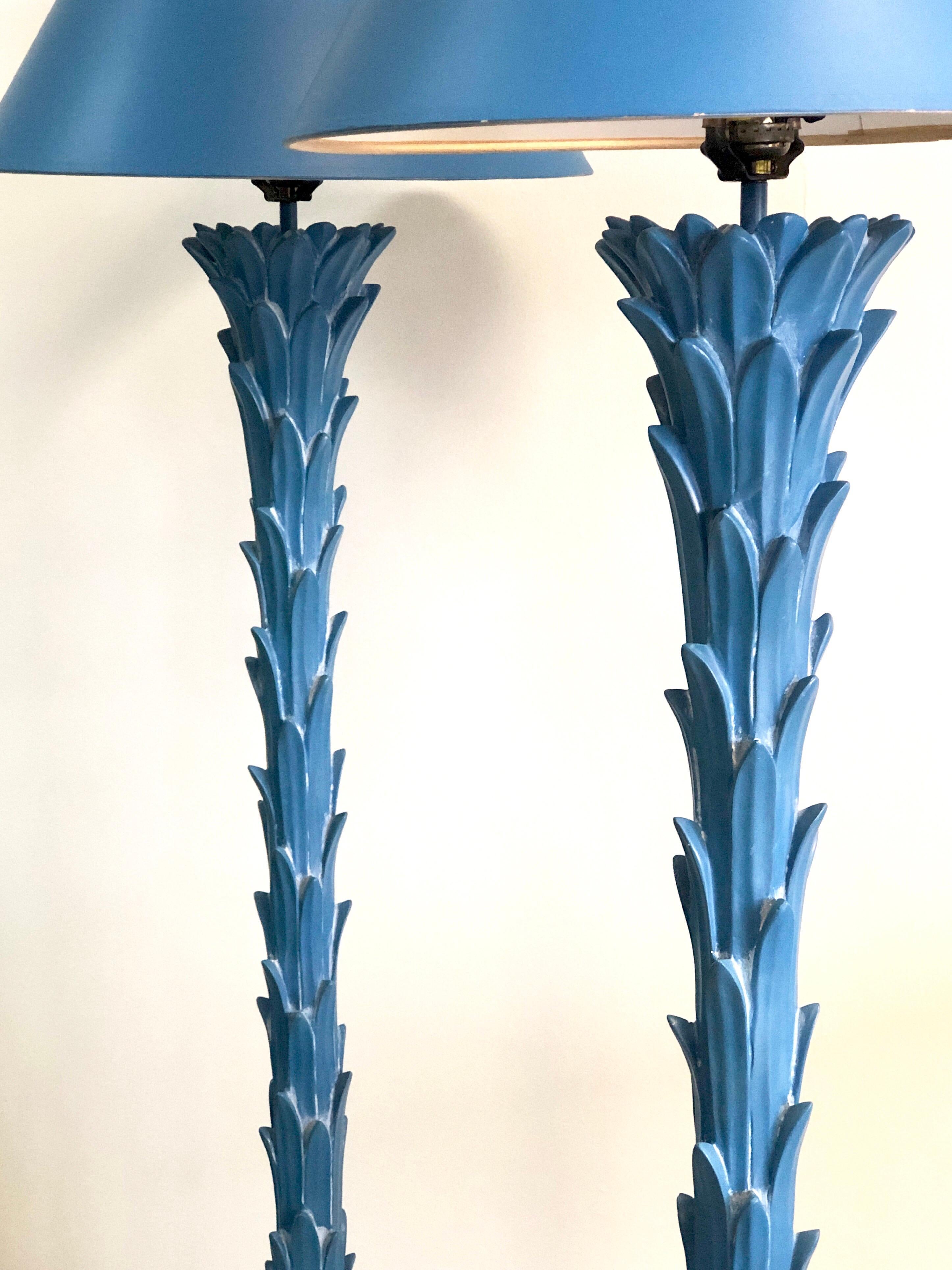 A pair of 1970s Chapman floor lamps. Beautiful detail and in very good condition with no brakes or repairs. Retain the original matching shades, shades are 16