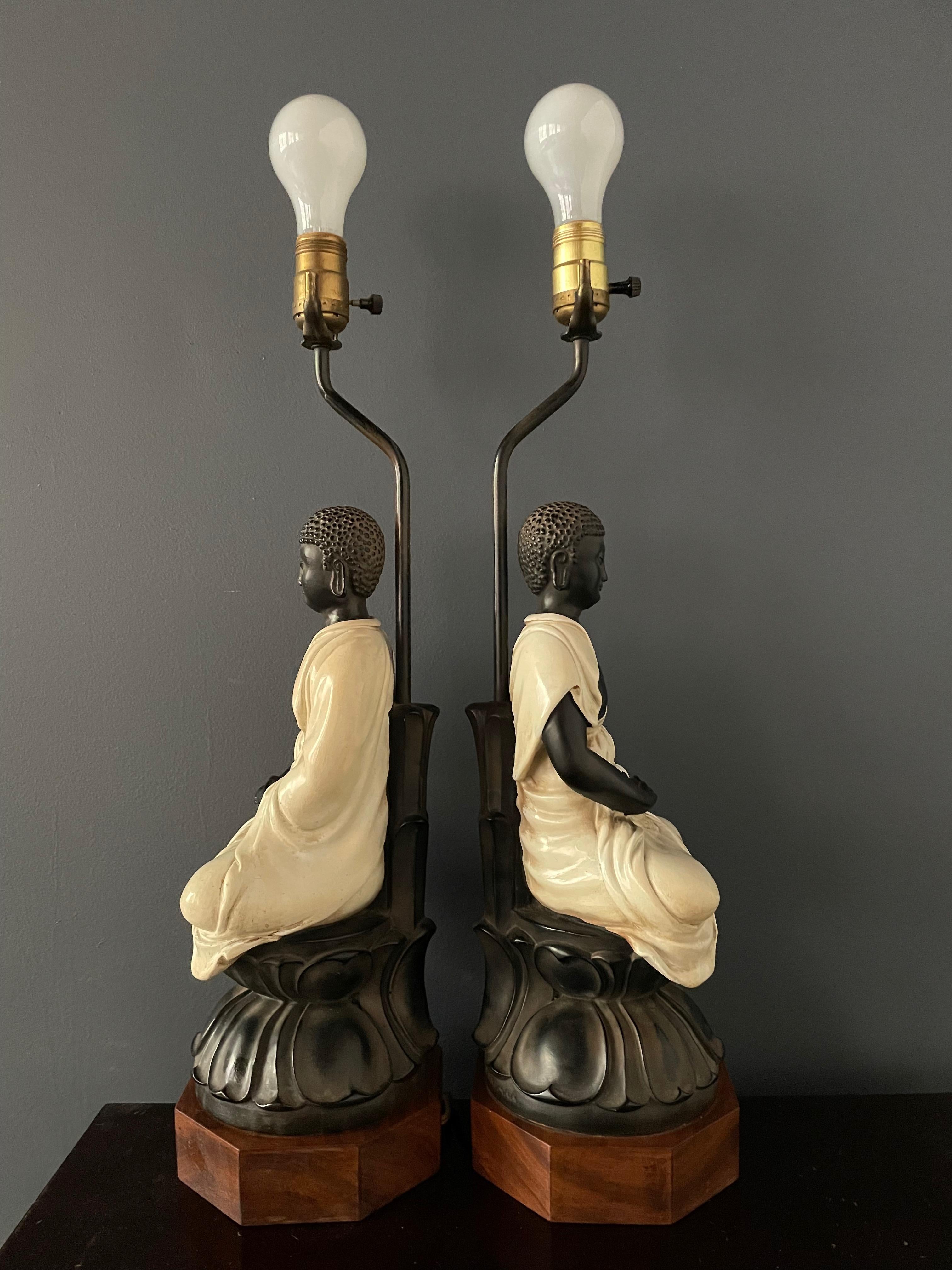 20th Century Chapman Pair Ceramic Table Lamps of Sitting Buddhas on Rosewood Base Mid Century For Sale