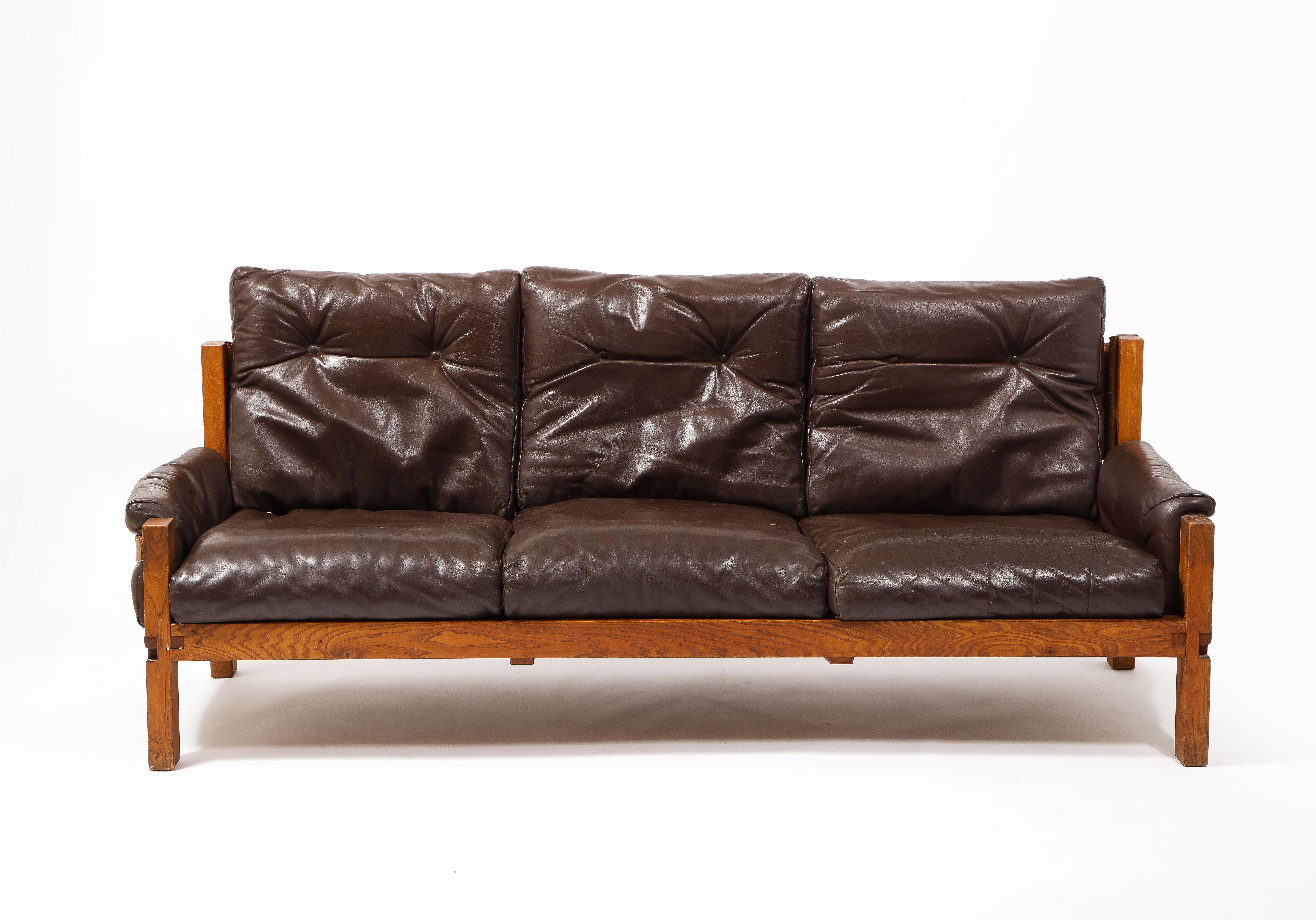The largest of the S22 series with three-seat. This sofa is all original with down filled leather cushions and original elm frame.