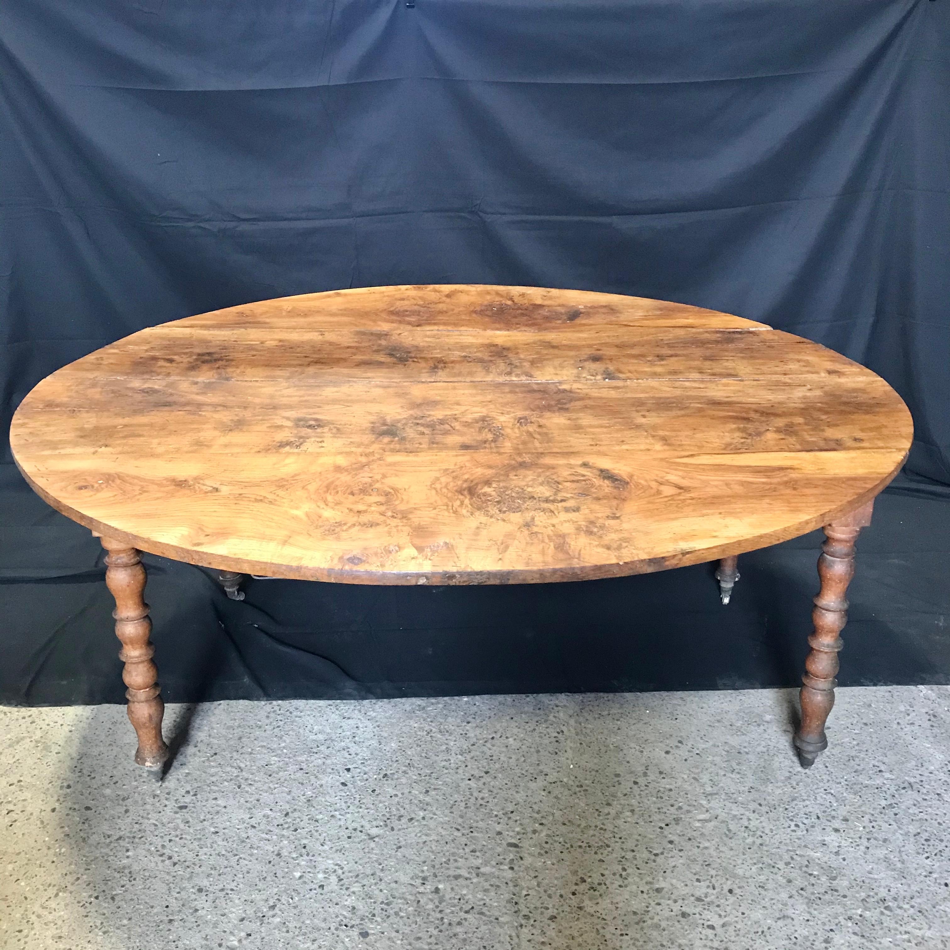 antique round drop leaf table