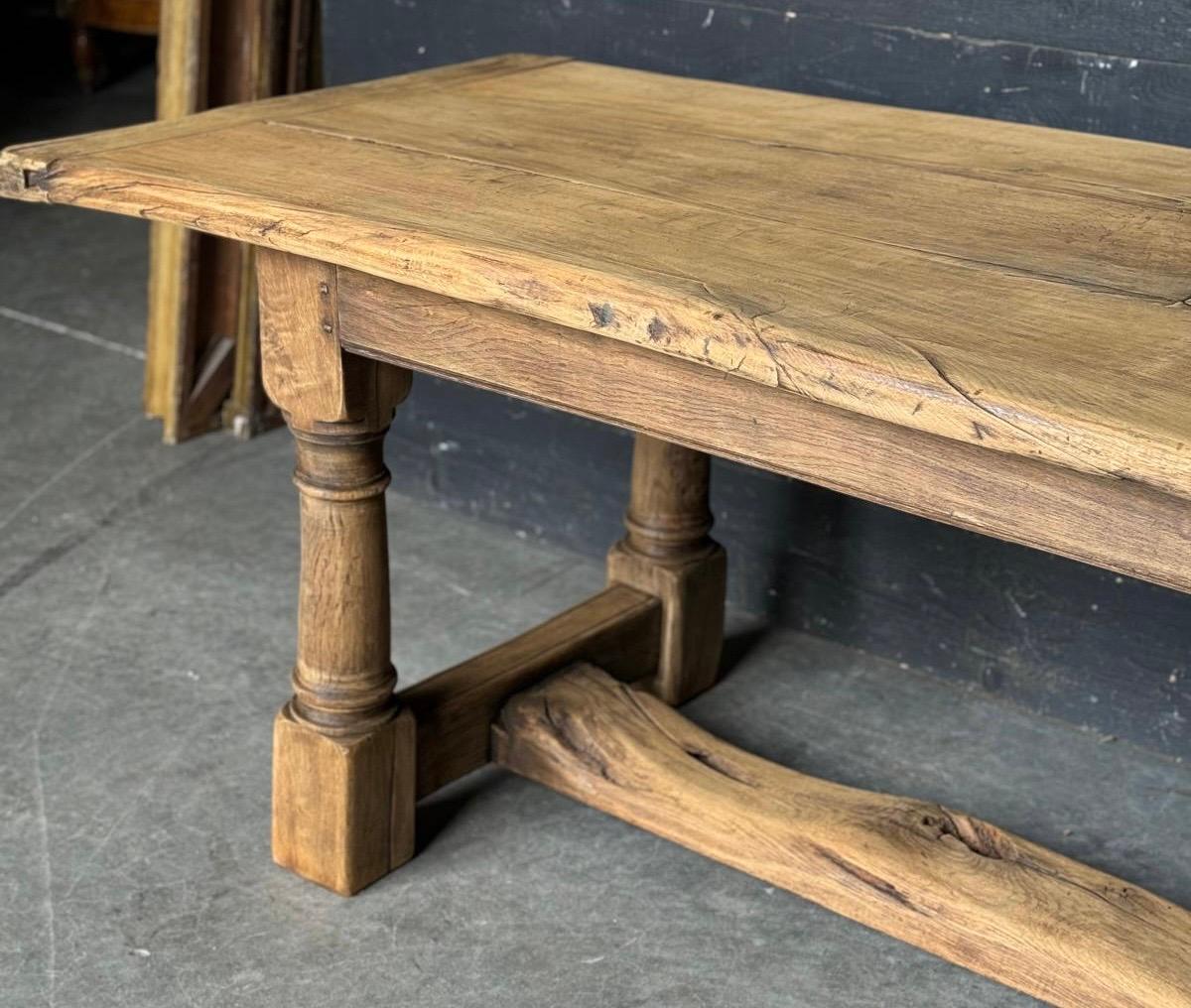 A lovely Solid Oak Farmhouse Dining Table having loads of character, French in origin and dating to the early 1900s, of excellent quality construction this table will be around for generations to come. 
We have bleached it for a lighter look and in