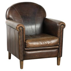 Characterful sheepskin design armchair with beautiful patina