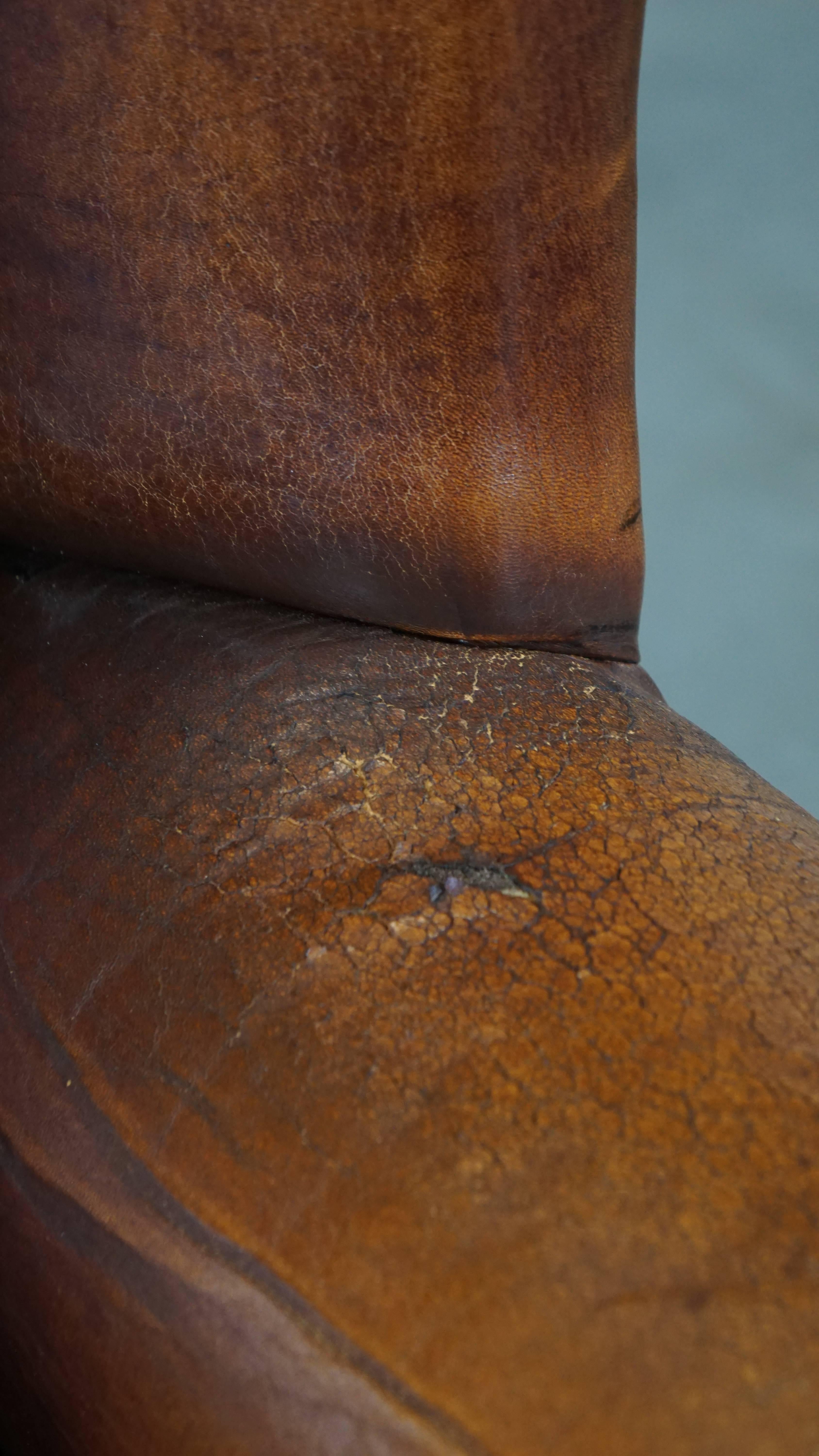 Characterful Vintage Sheepskin Leather Wingback Chair with Beautiful Colors For Sale 6