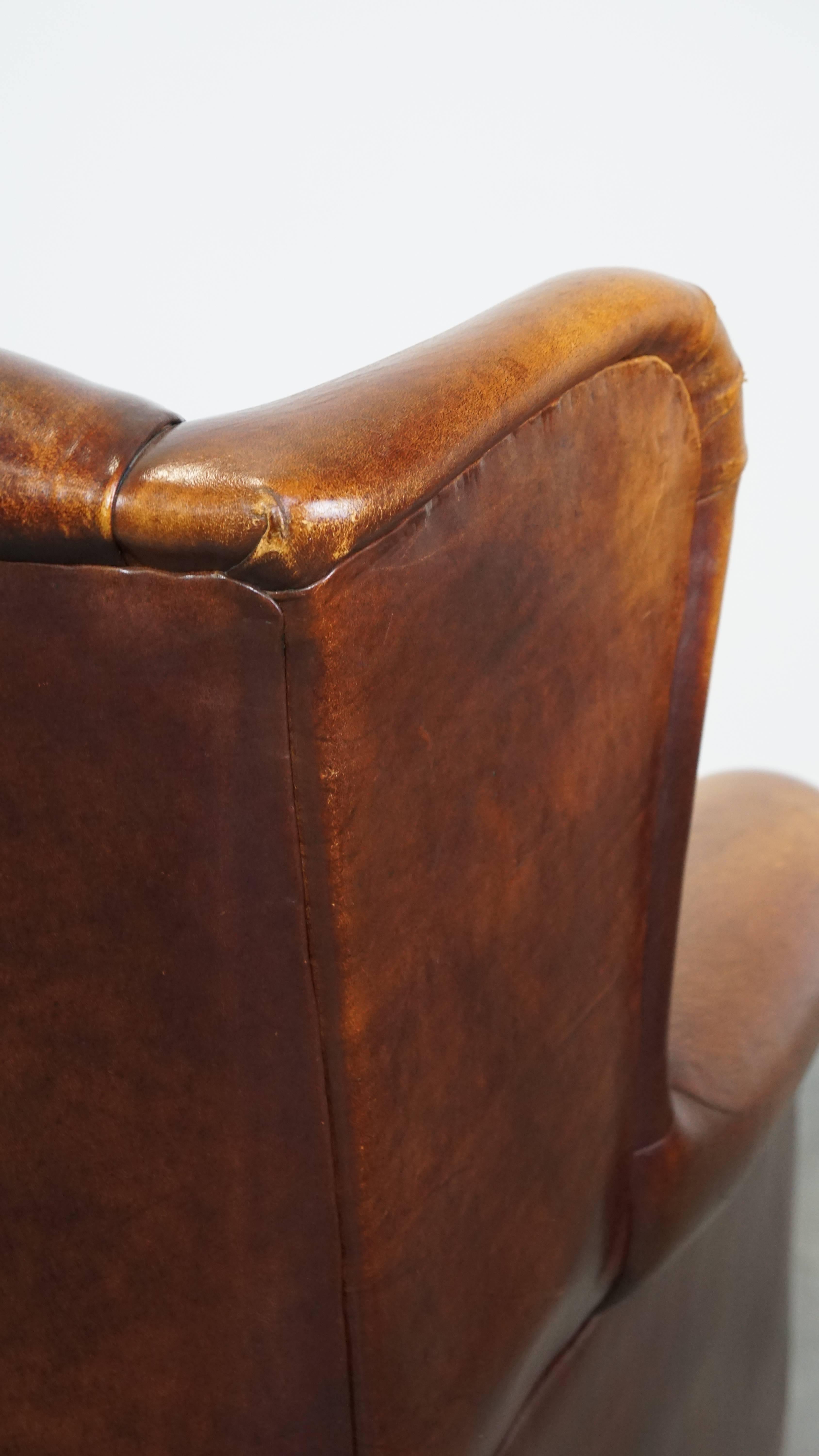 Characterful Vintage Sheepskin Leather Wingback Chair with Beautiful Colors For Sale 8
