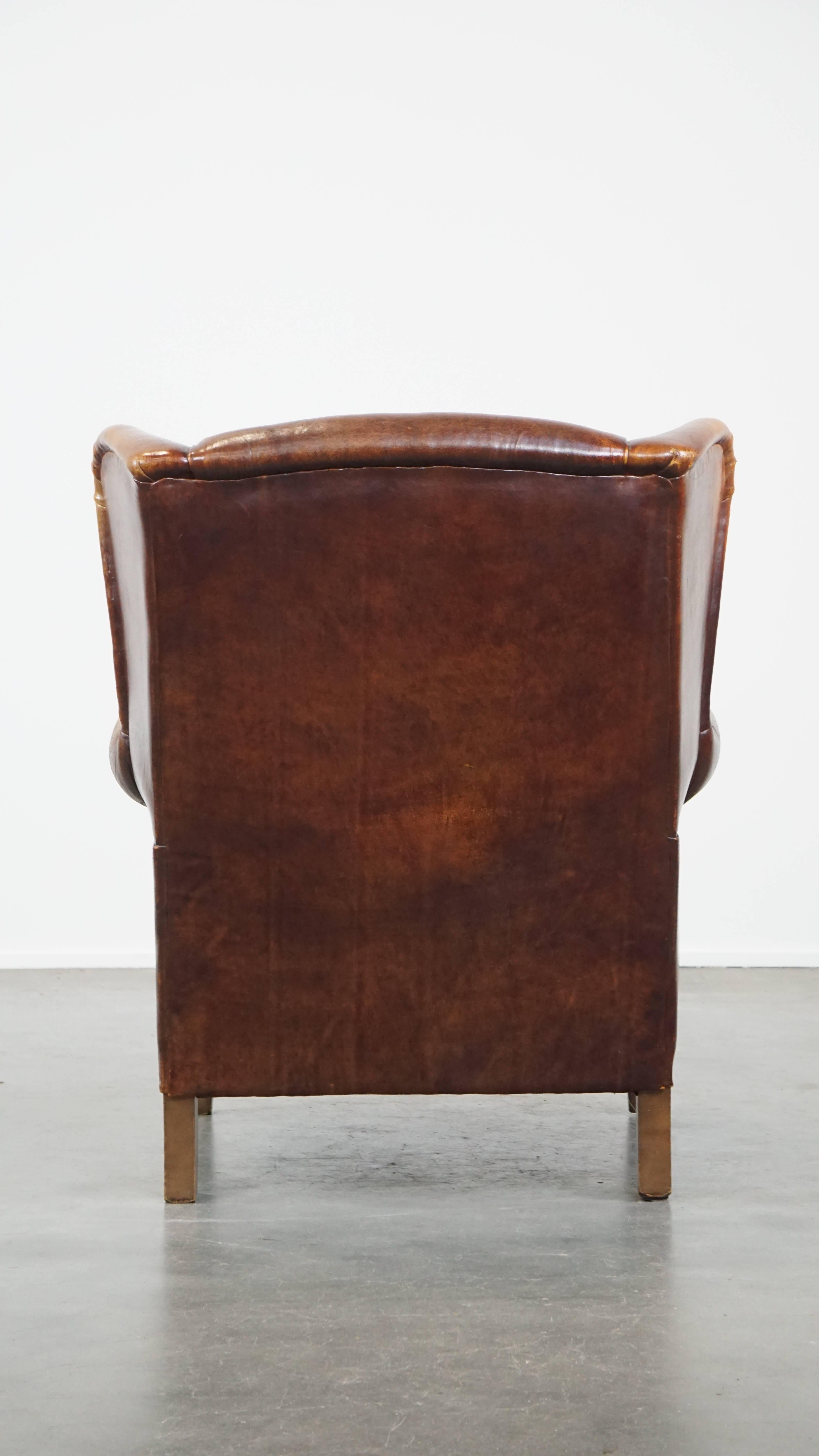 Hand-Crafted Characterful Vintage Sheepskin Leather Wingback Chair with Beautiful Colors For Sale