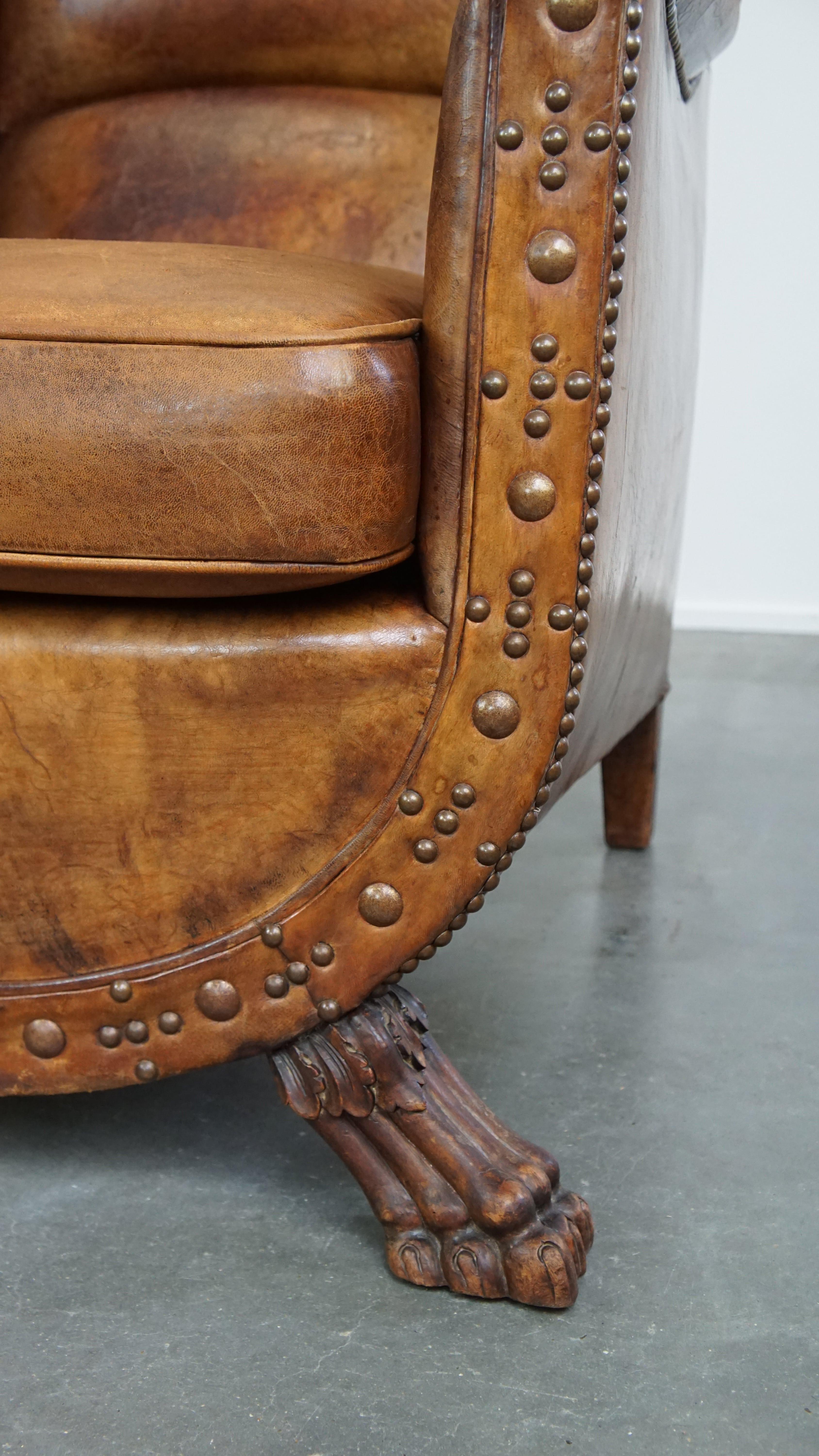Characteristic antique sheepskin leather armchair with beautiful unique details For Sale 10