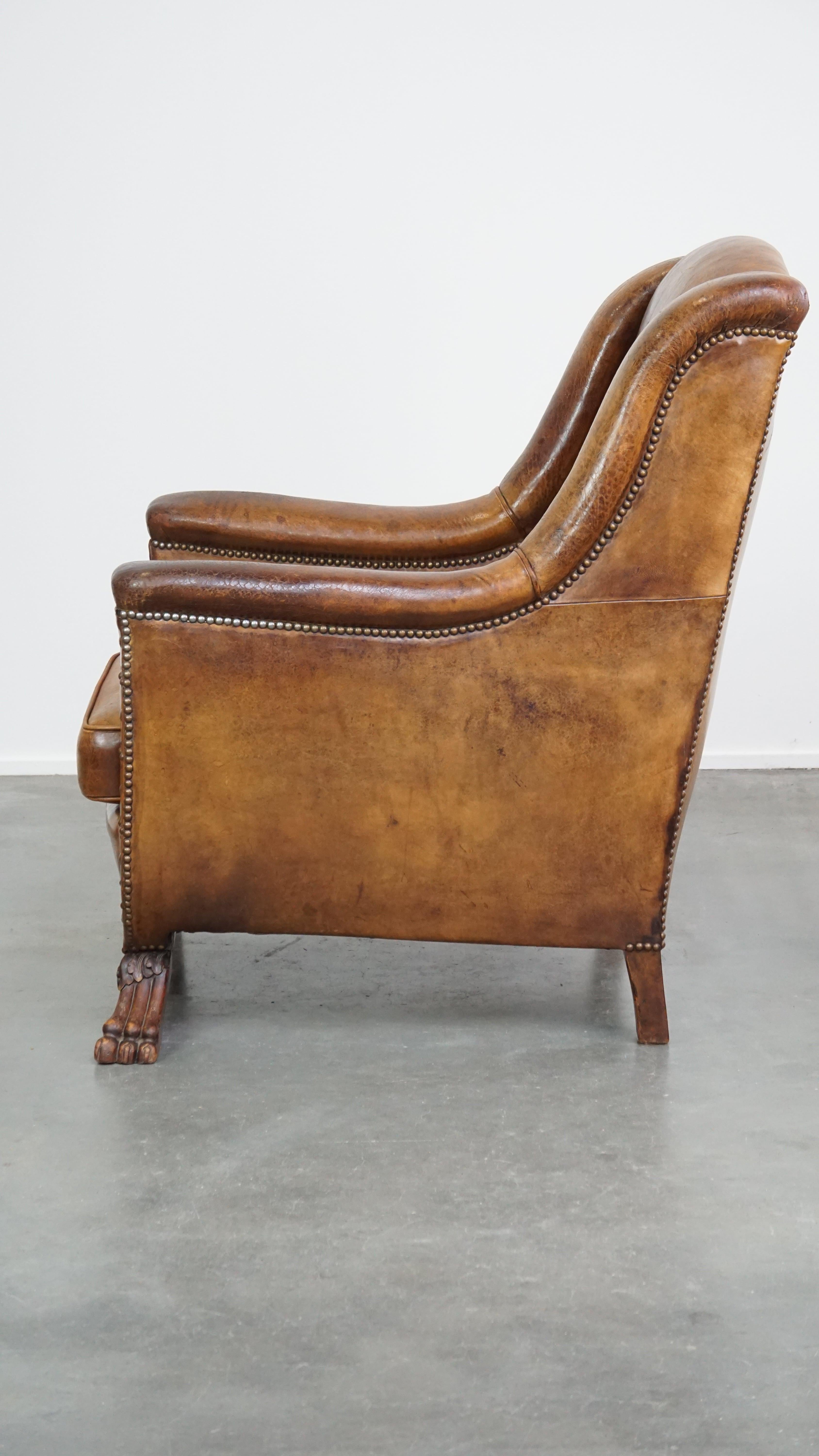 19th Century Characteristic antique sheepskin leather armchair with beautiful unique details For Sale