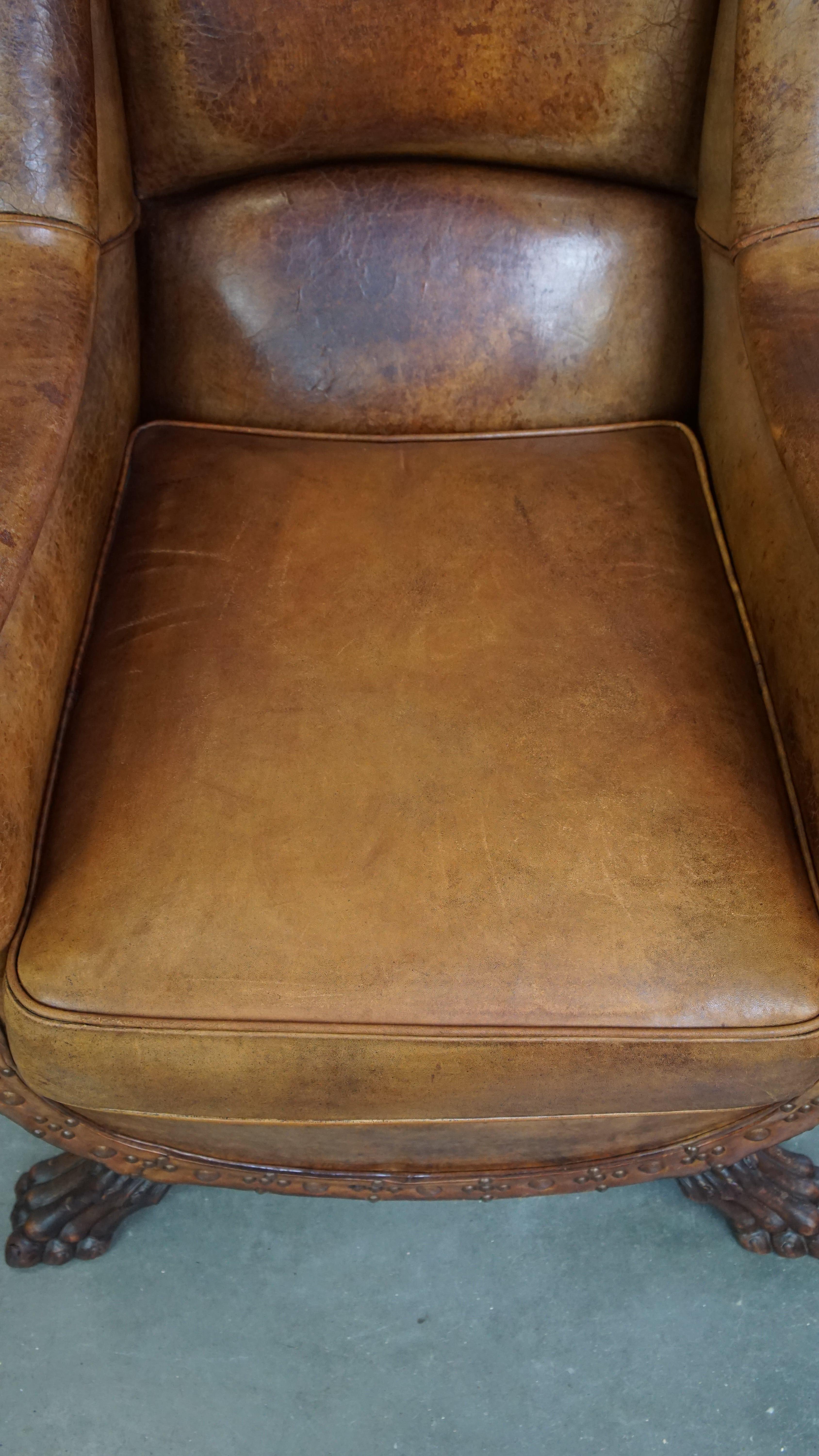 Sheepskin Characteristic antique sheepskin leather armchair with beautiful unique details For Sale