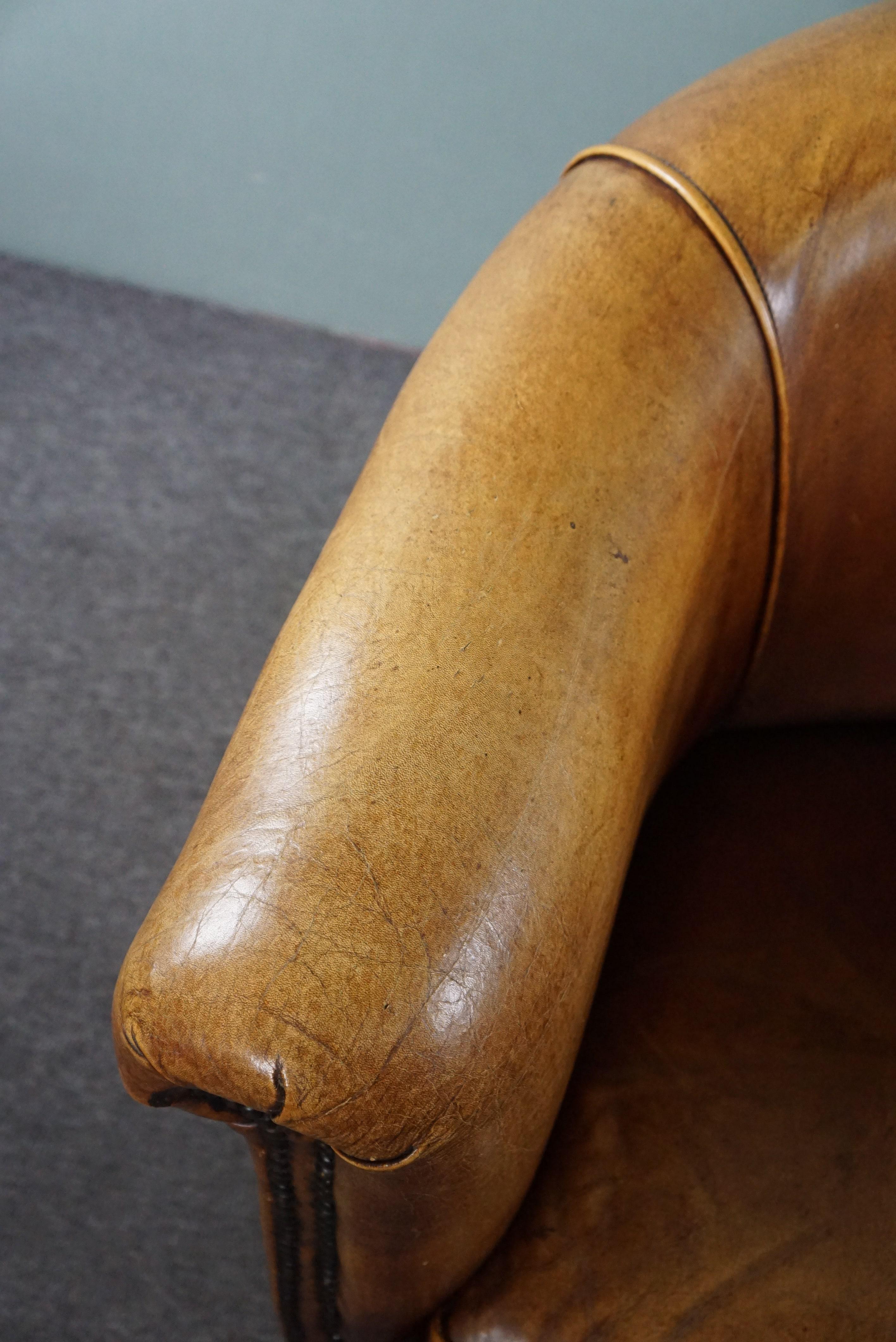 Characteristic club chair made of cowhide leather For Sale 2