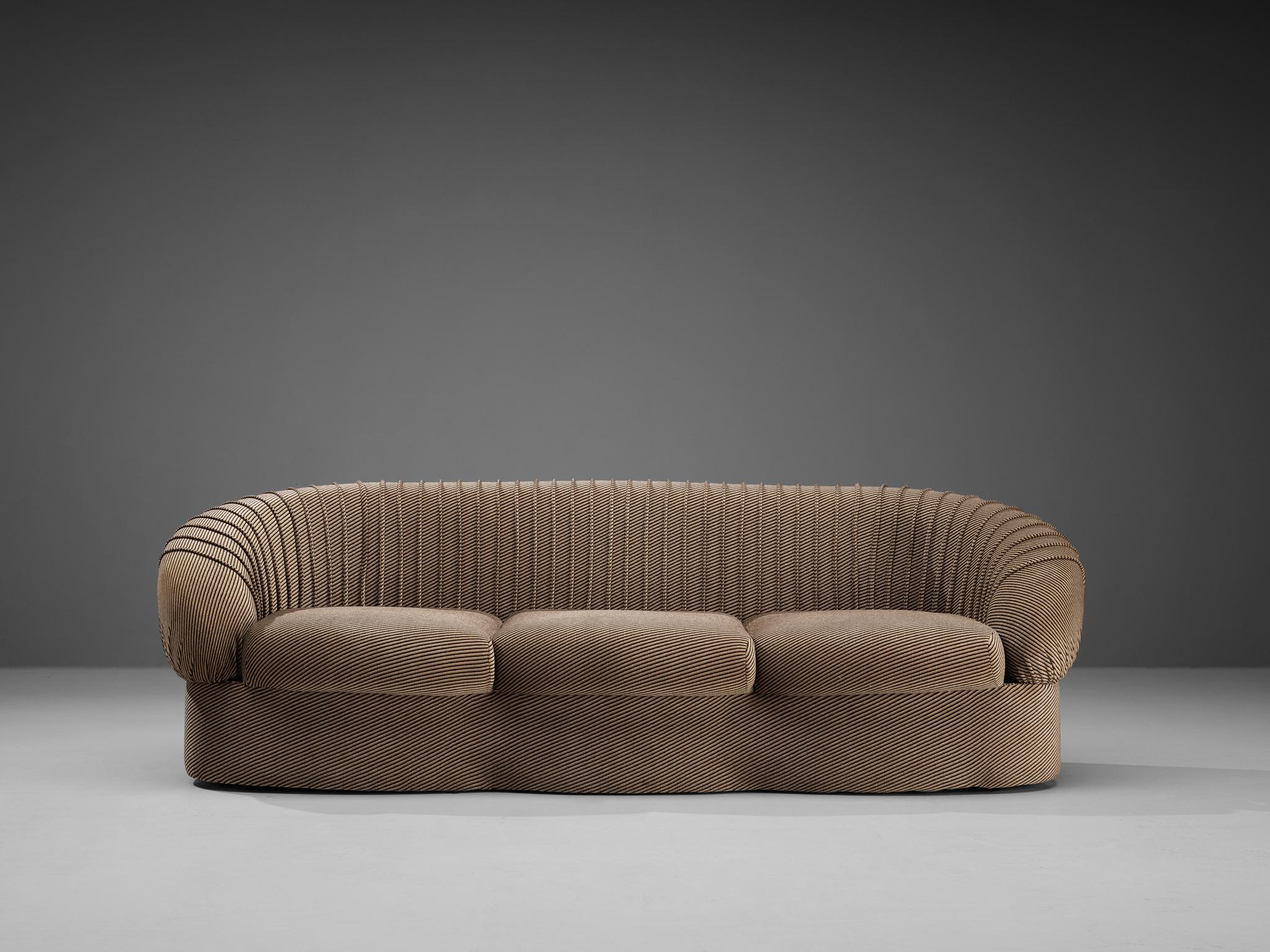 Sofa, fabric, Italy, 1970s

This charming Italian sofa comes with a characteristic upholstery of black diagonal stripes and twisted cords. The design has a certain theatrical aesthetic with curved armrests flowing inwards and the round shapes