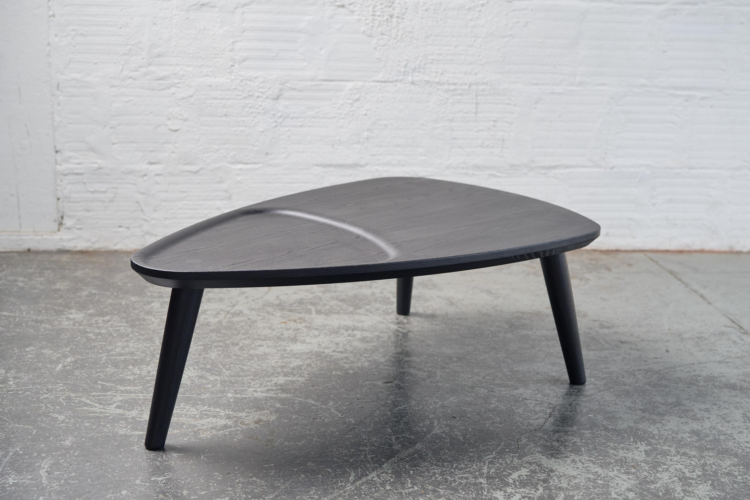 Charcoal Ash Oxbend Coffee Table by Fernweh Woodworking
Dimensions: Side A 127 x Side B 122 x Side C 89 x H 40.5 cm.
Materials: Charcoal Ash.

Available in walnut and white ash. Also available in 47 cm height. Please contact us.

Justin Nelson
He is