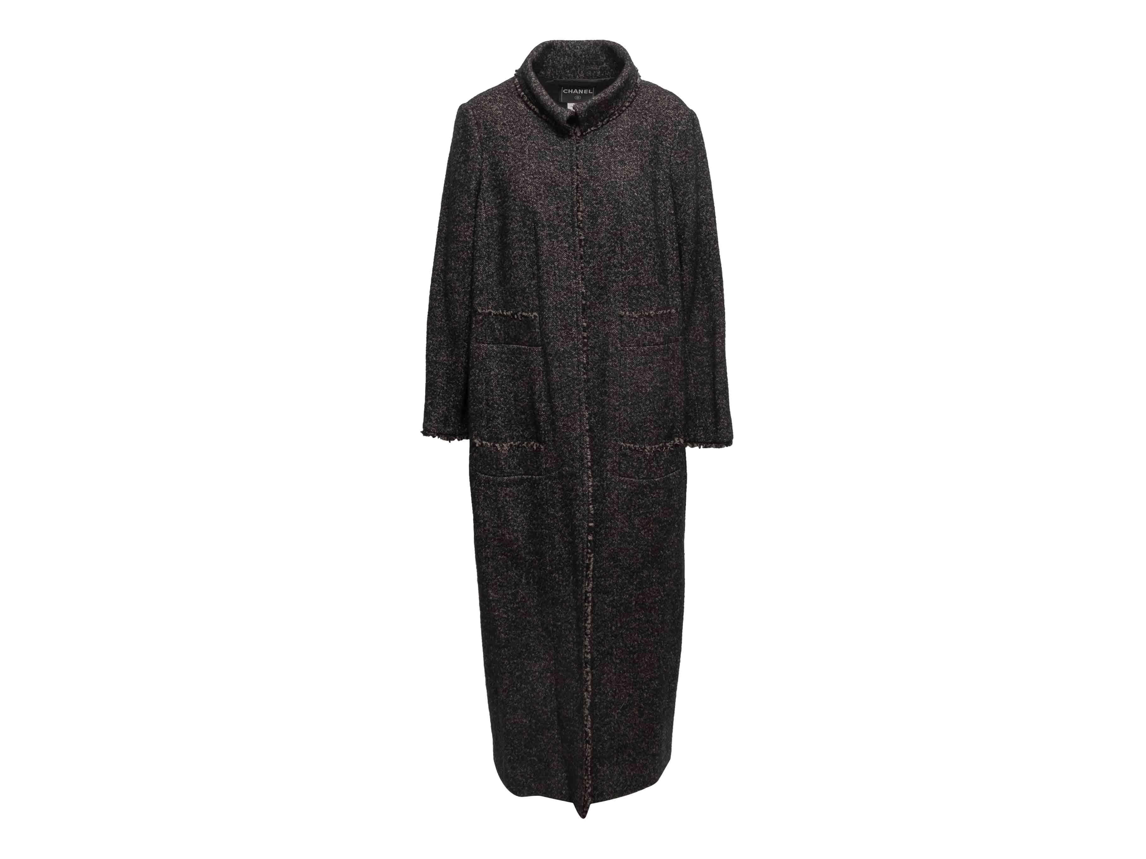 Charcoal herringbone long wool coat by Chanel. Stand collar. Four front pockets. Front closure. 42
