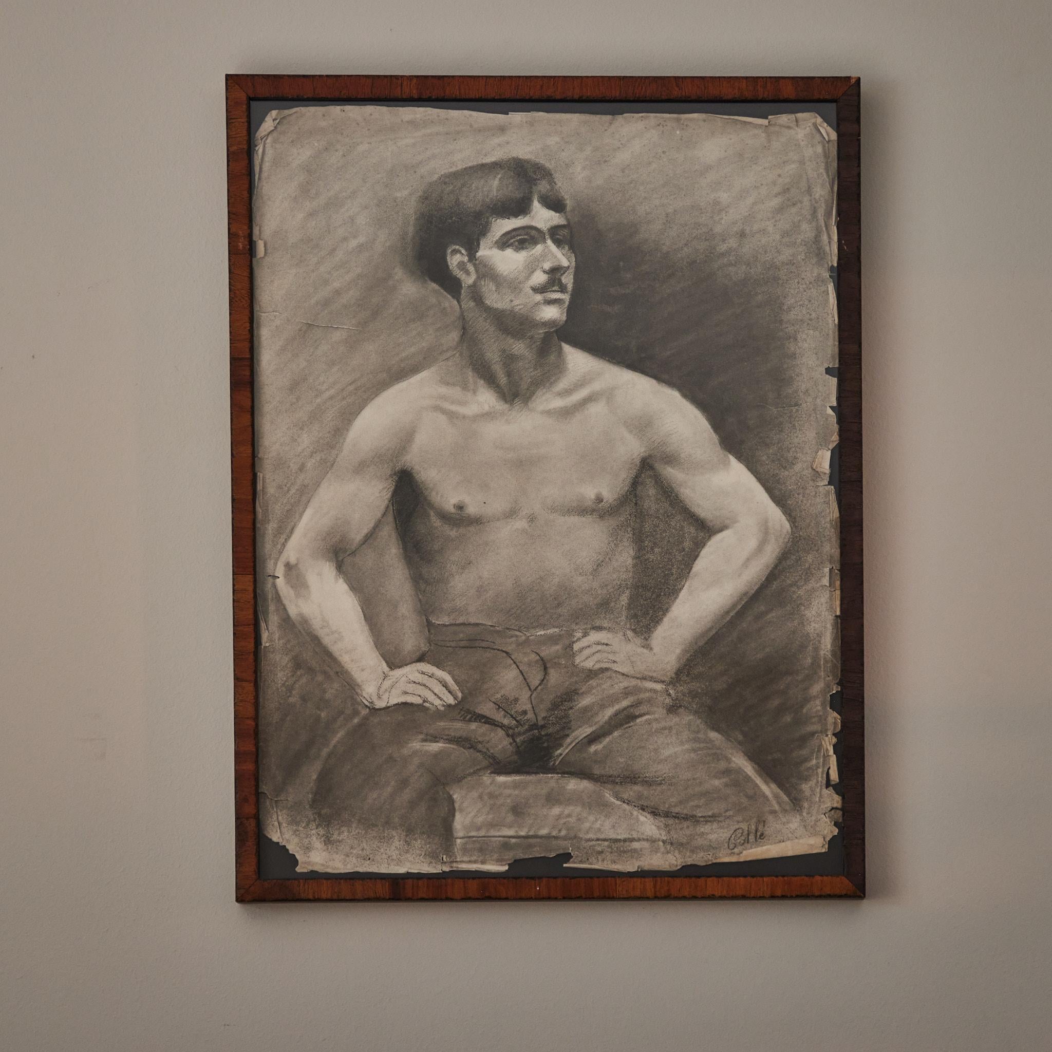 Early 20th-century French Academy-style charcoal drawing of seated male model. Mounted in a custom wood frame, the image has an introspective quality, and a charmingly exploratory sense of line. 
