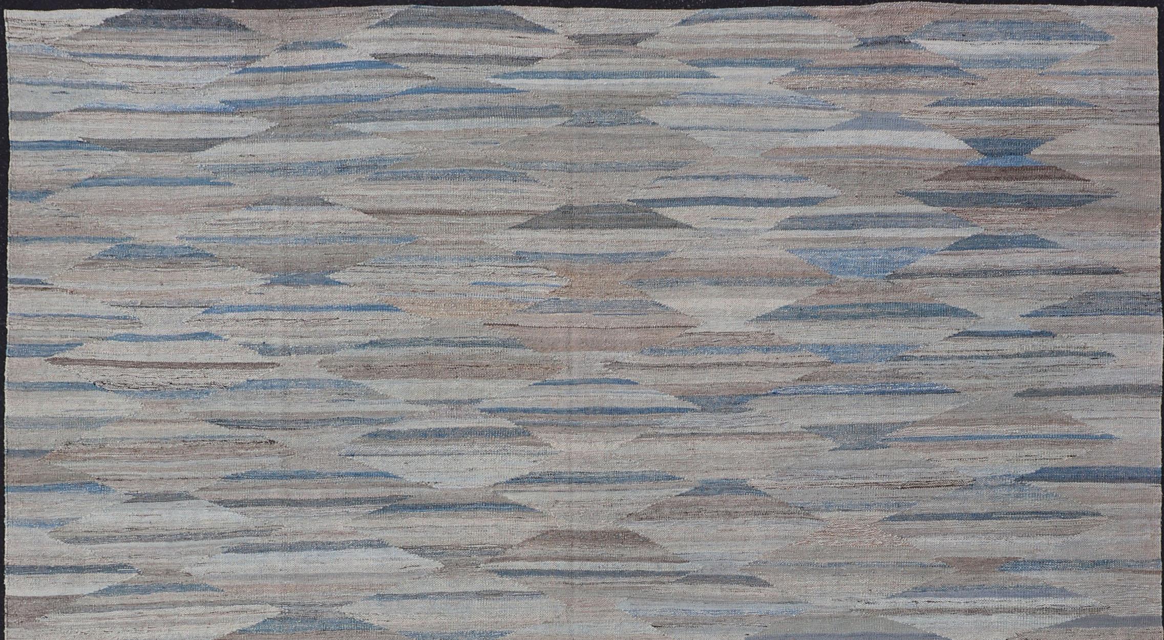 Modern and casual flat-woven Kilim rug in charcoal, gray, blue and brown diamond Afghan Modern Kilim Geometric design. Keivan Woven Arts , Rug AFG-131, country of origin / type: Afghanistan / Kilim

The unique design of this groovy flat-weave
