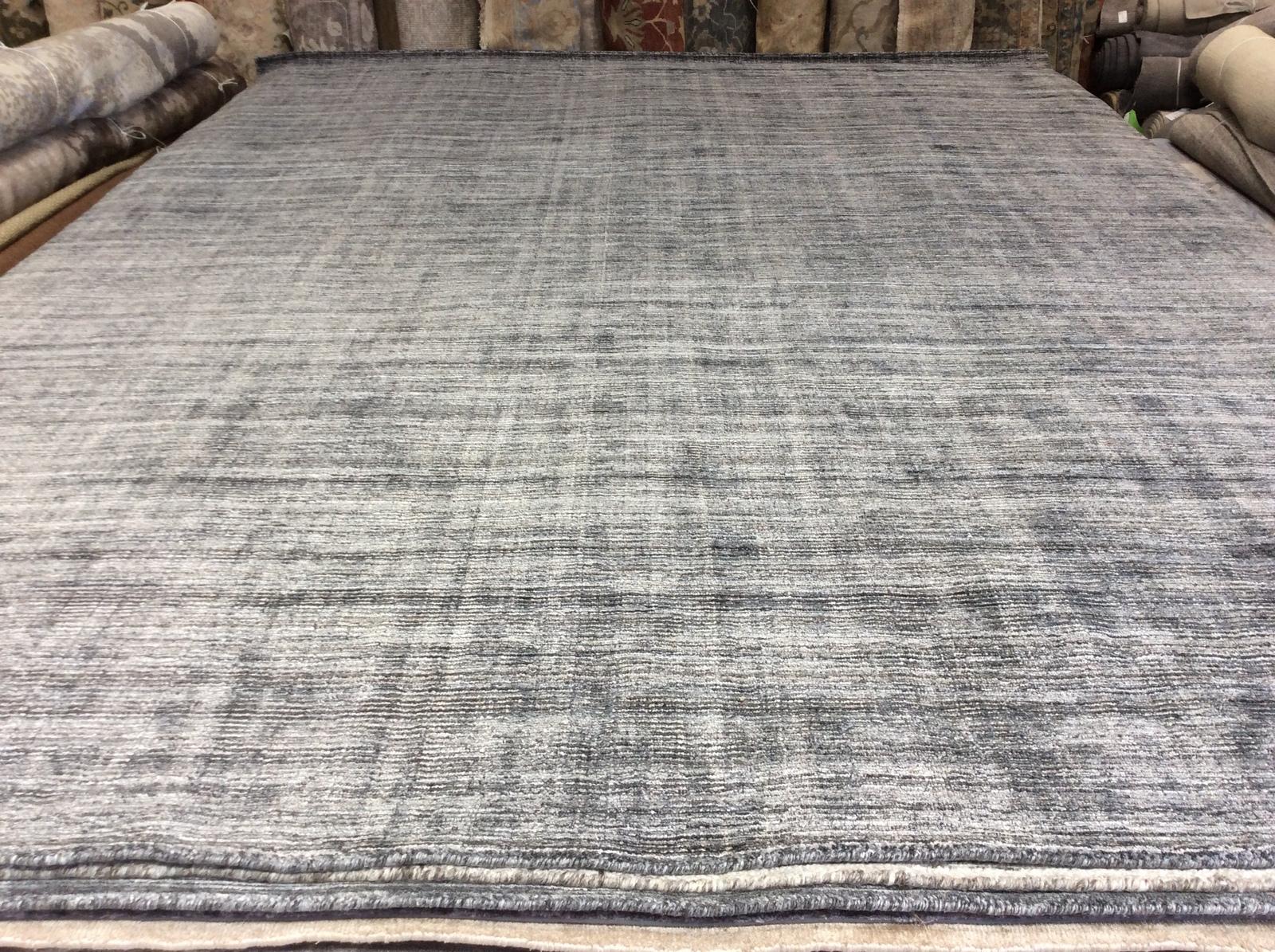Trending in popularity again, the loop and cut style (combining looped with cut fibers) offers both texture and visual interest. Hand knotted wool. Best suited for areas of low to moderate traffic areas such as bedrooms or dens. Made in India.