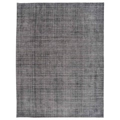 Tapis bouclé et découpé anthracite