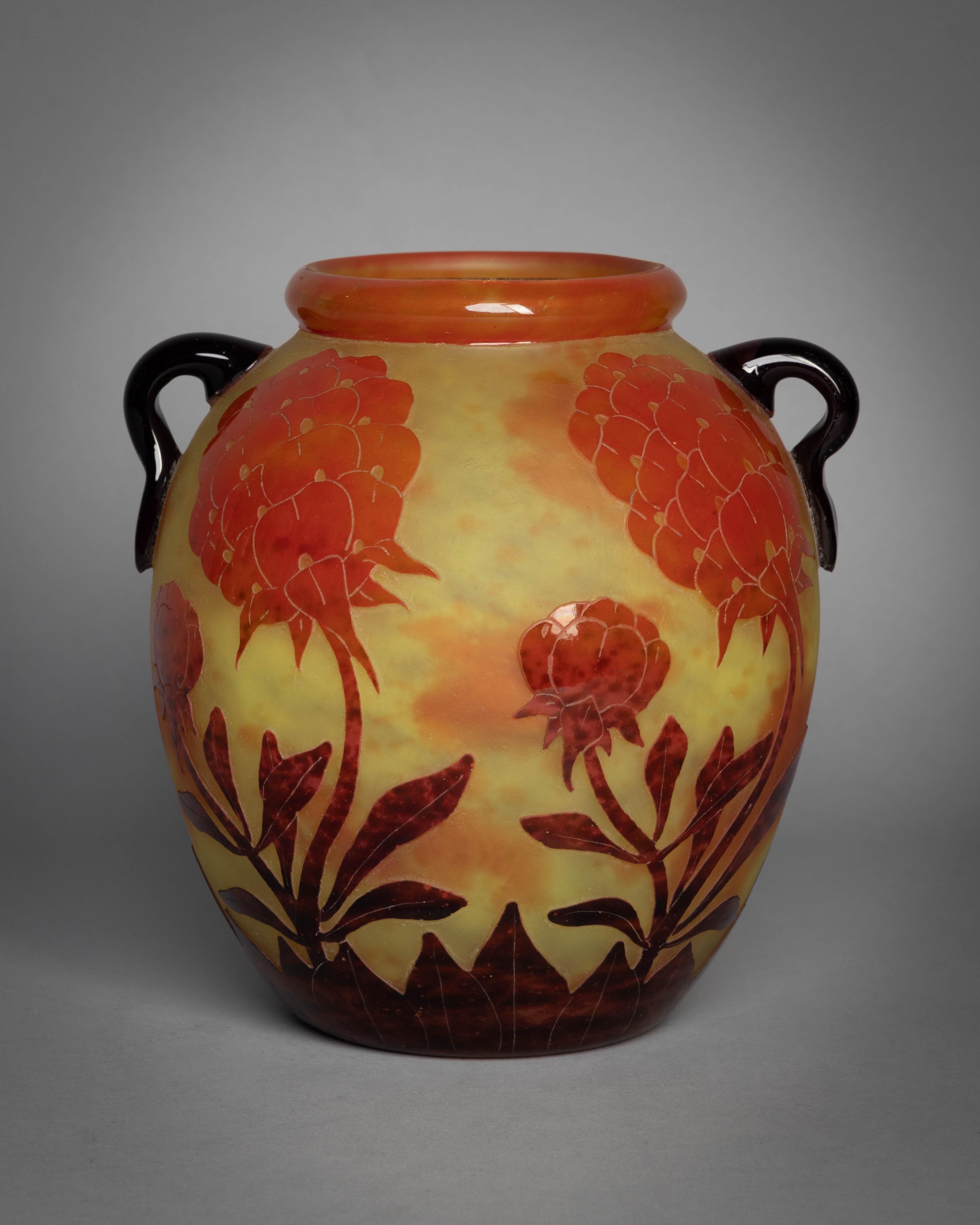 Yellow glass overlaid with orange and brown and etched with stylized peonies and leaves, cameo mark Charder, engraved Le Verre Français, acid-stamped FRANCE.