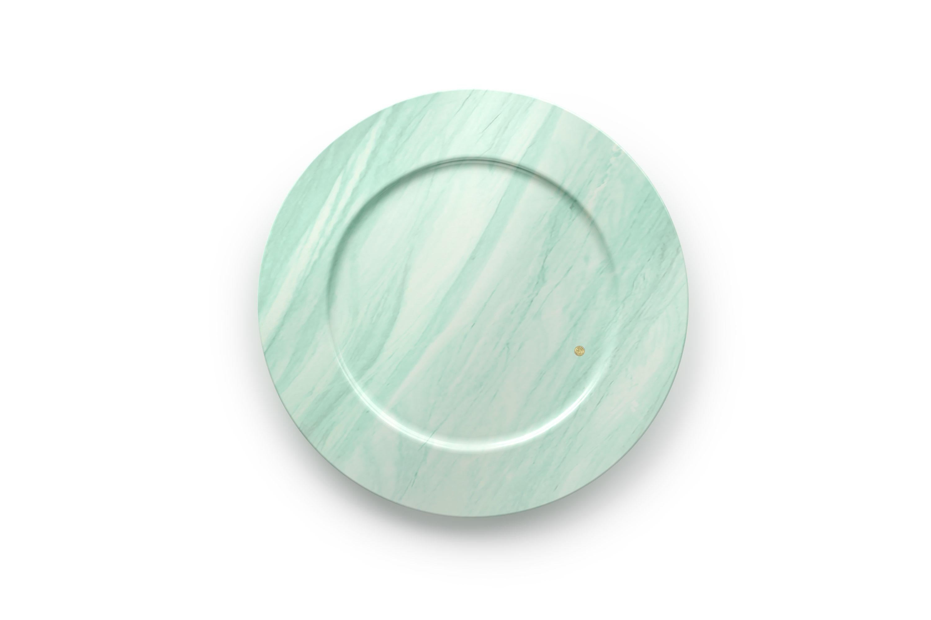 Hand carved charger plate from semi-precious green quartzite. Multiple use as charger plates, plates, platters and placers. 

Dimensions: D 33, H 1.9 cm. Available in different marbles, onyx and quartzite. 

100% Hand made in Italy.

Marble is a