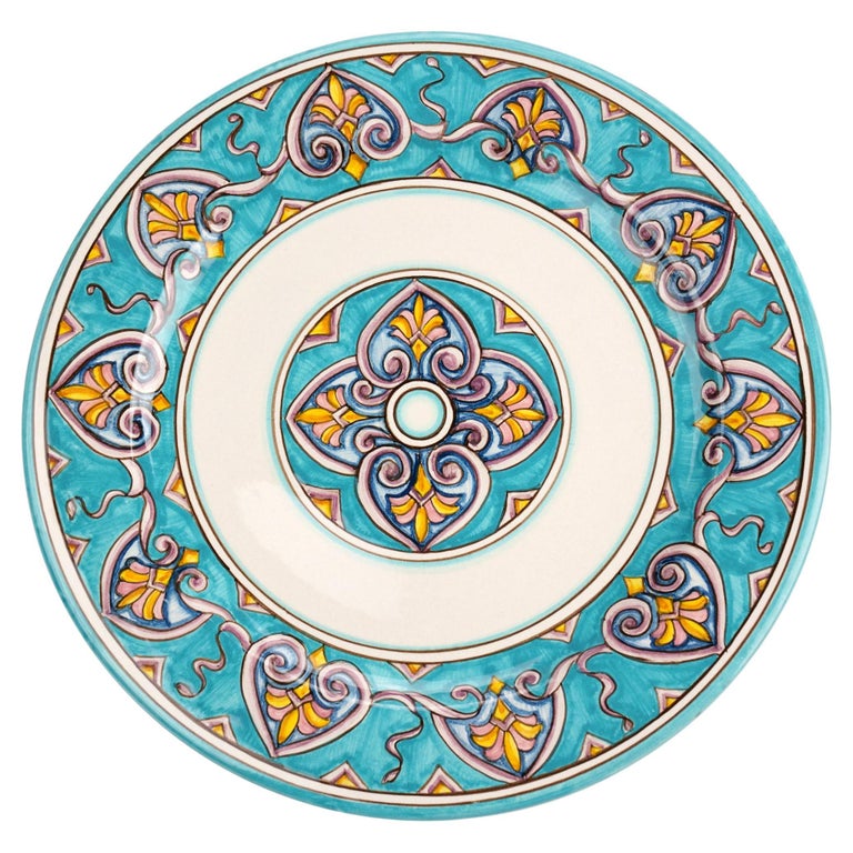 This colorful and elegant set of 4 majolica charger plates is handmade and hand-painted in Italy following the original Renaissance painting technique, unchanged over time, which we observe to the letter: every artist's brushstroke, which you can