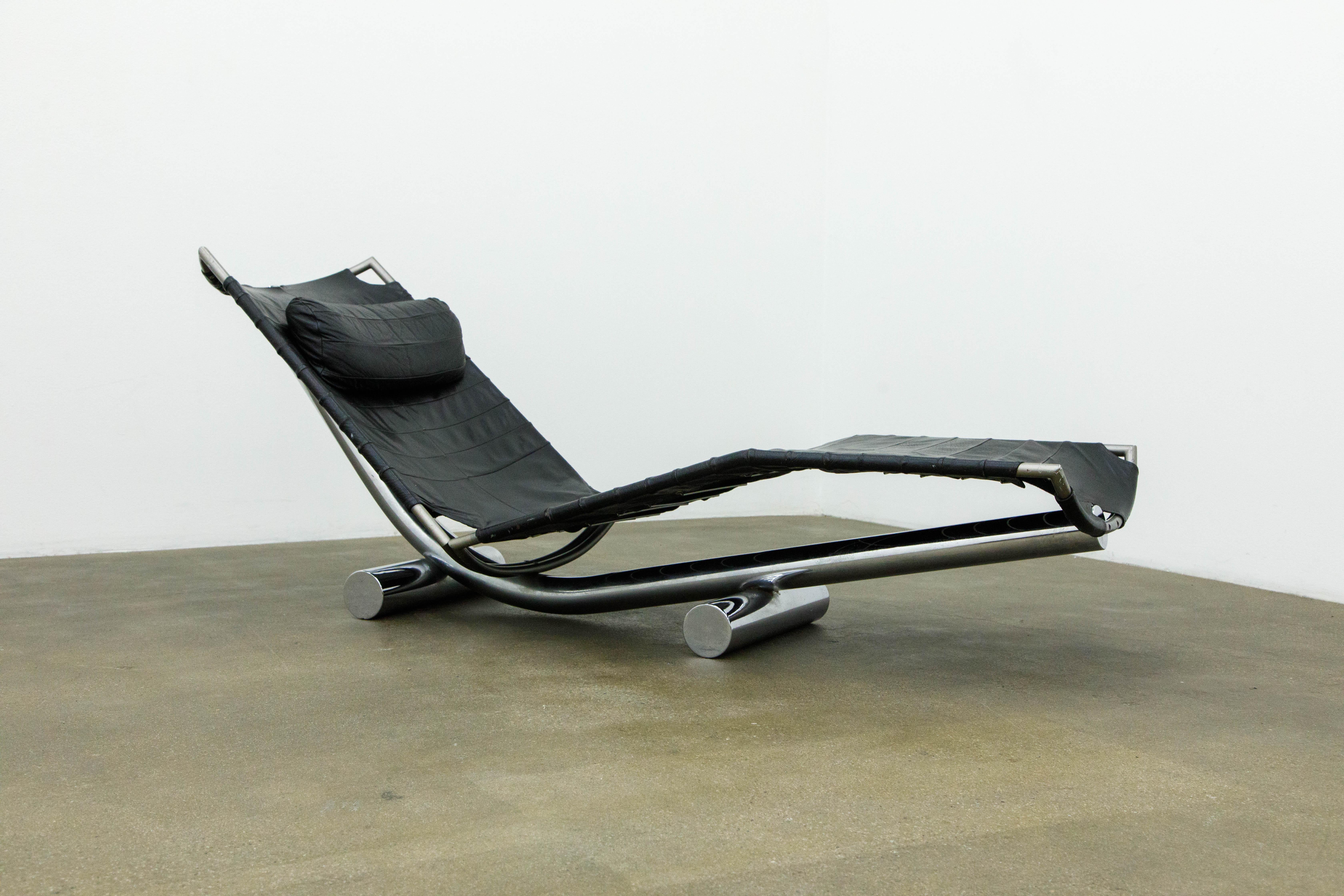 A unique 'Chariot' chaise lounge by Paul Tuttle for Strassle International, circa 1972 Switzerland. Constructed from chrome plated tubular steel frame and leather sling, this suspended design chaise is comfortable, collectible, and looks incredible.