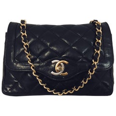 Charismatic Chanel Vintage Black Lambskin 2.55 Flap Bag with Silver & Gold CC
