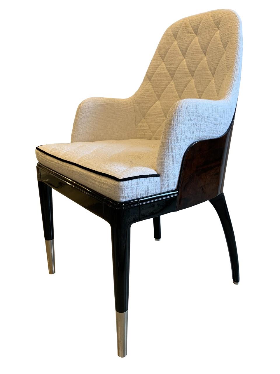 Charla dining chair is a splendid and stylish chair with boundless elegance. This marvelous chair design is the perfect example of timeless lines with a modern twist, by using a complexity of luxurious materials, such as velvet, brass and lacquered
