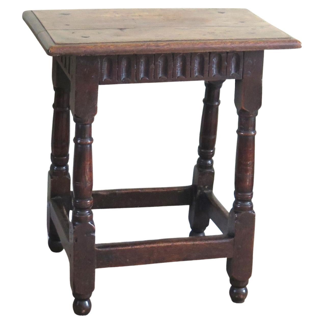 This is a genuine period English antique oak stool, dating to the early / mid 17th century, Charles 1st Carolean period, circa 1630.

Genuine original stools from this period are rare.

This stool is hand made of solid oak with pegged mortise and