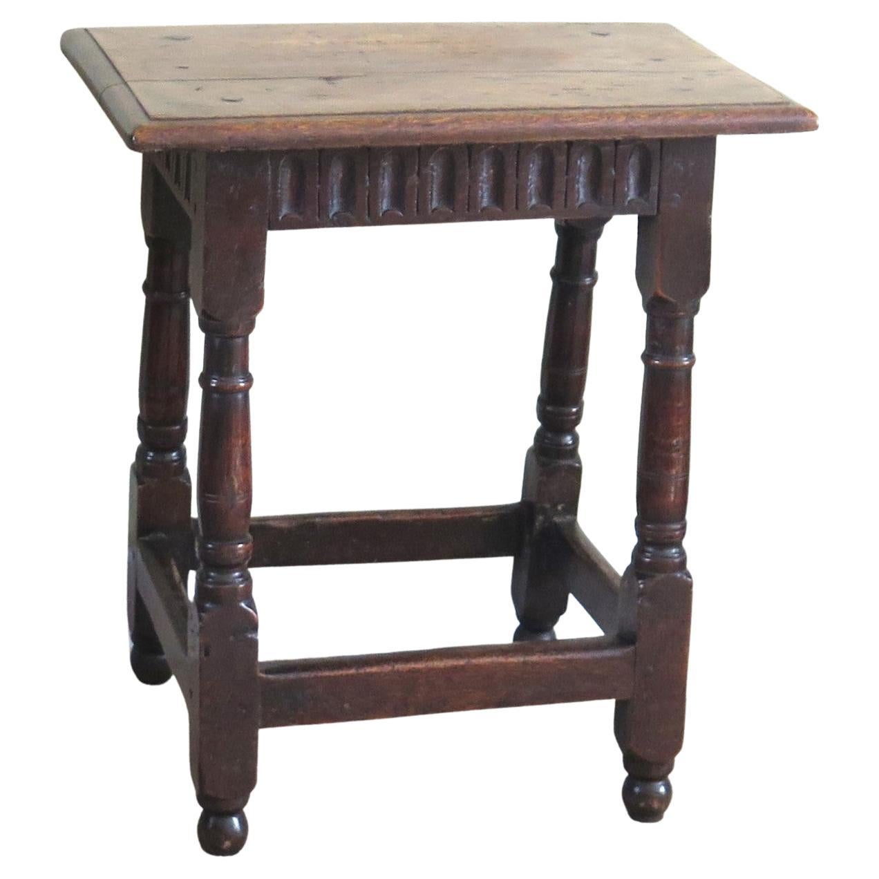 This is a genuine period English oak stool, dating to the early / mid 17th century, Charles 1st Carolean period, circa 1630.

Genuine original stools from this period are rare.

This stool is hand made of solid oak with pegged mortise and tenon