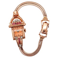 CHARLES AERNI 1938 Orologio da polso da donna Art Deco in oro rosa 14Kt con rubini e diamanti