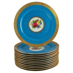 Charles Ahrenfeldt Limoges, handbemalte, vergoldete, vergoldete Schrankteller mit Verzierungen, 12er-Set