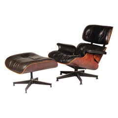 Charles and Ray Eames fauteuil de salon en bois de rose 670 et pouf 671