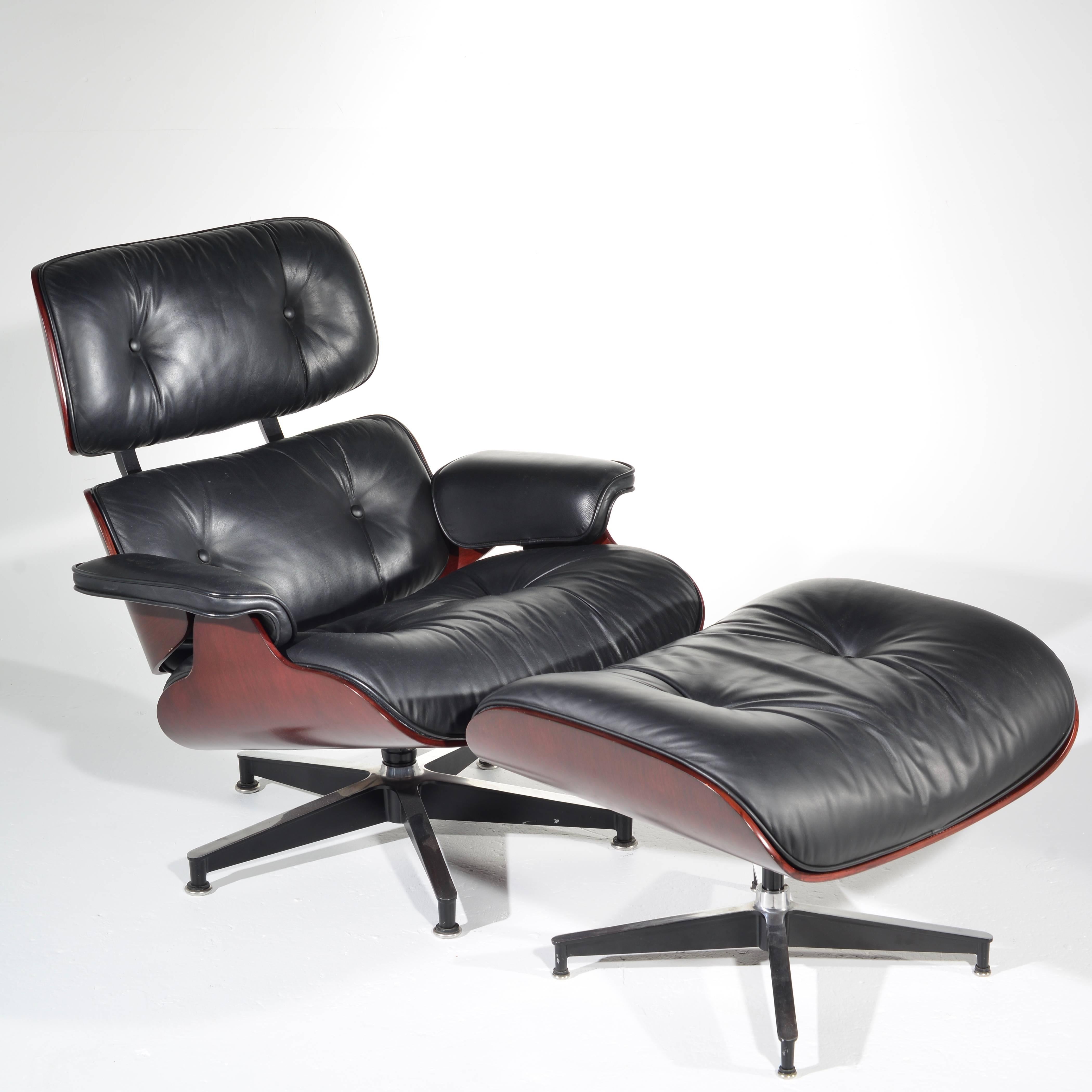 Modern Charles and Ray Eames Cherry and Leather 670 Lounge Chair and 671 Ottoman