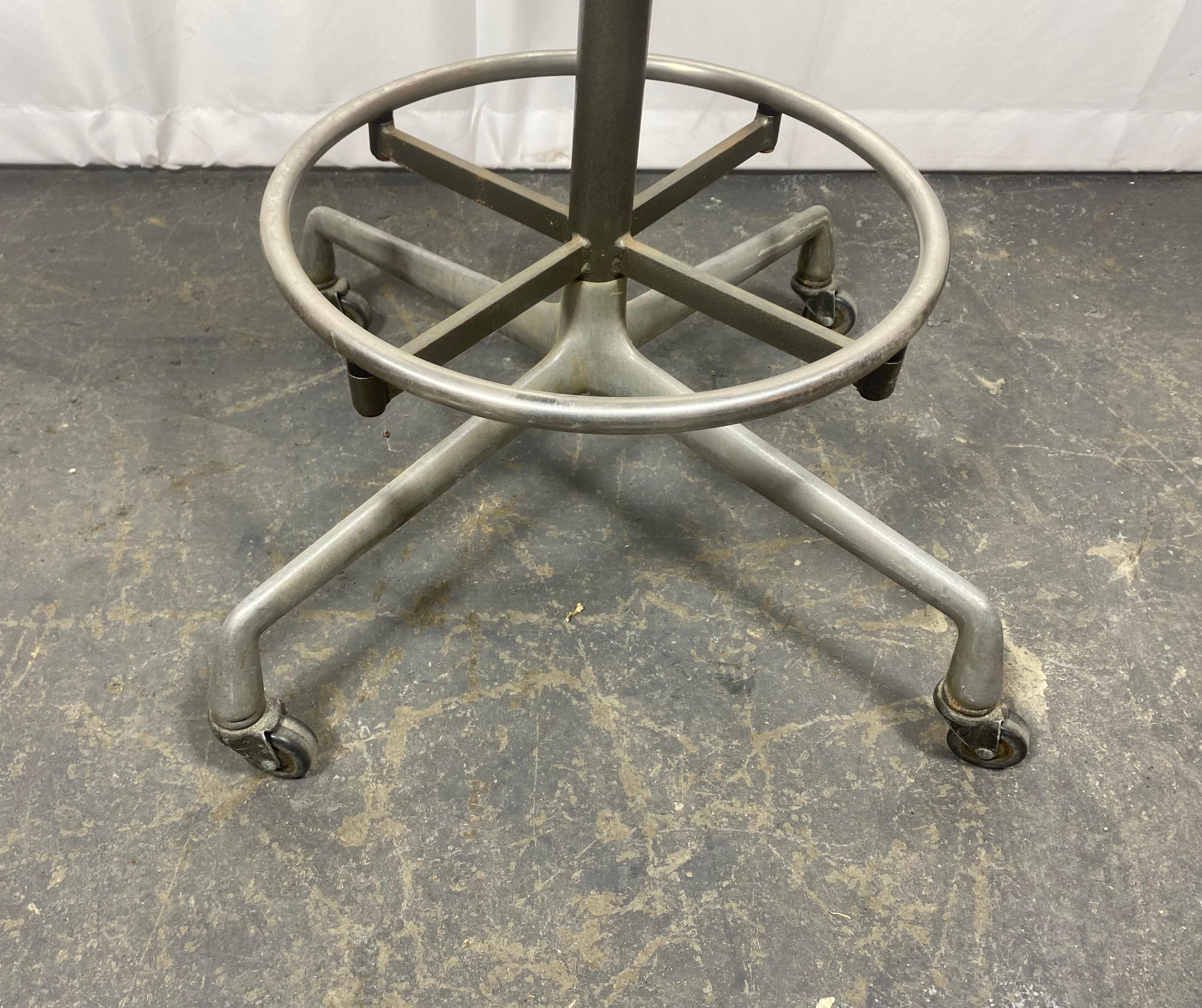 Aluminum Charles and Ray Eames Drafting Stool for Herman Miller , castors. c.1974 