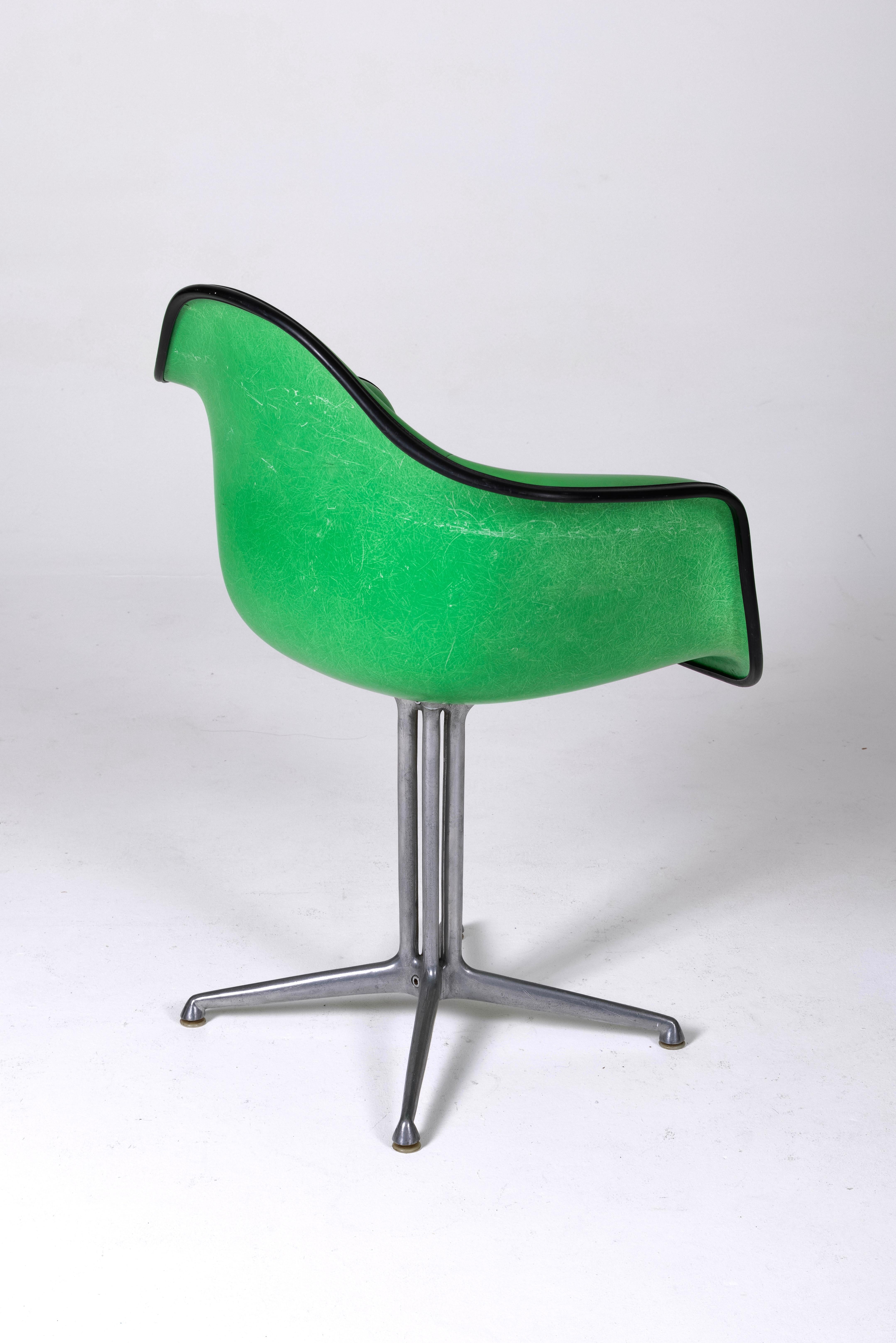 Charles and Ray Eames' Eames Plastic leather armchair. 2