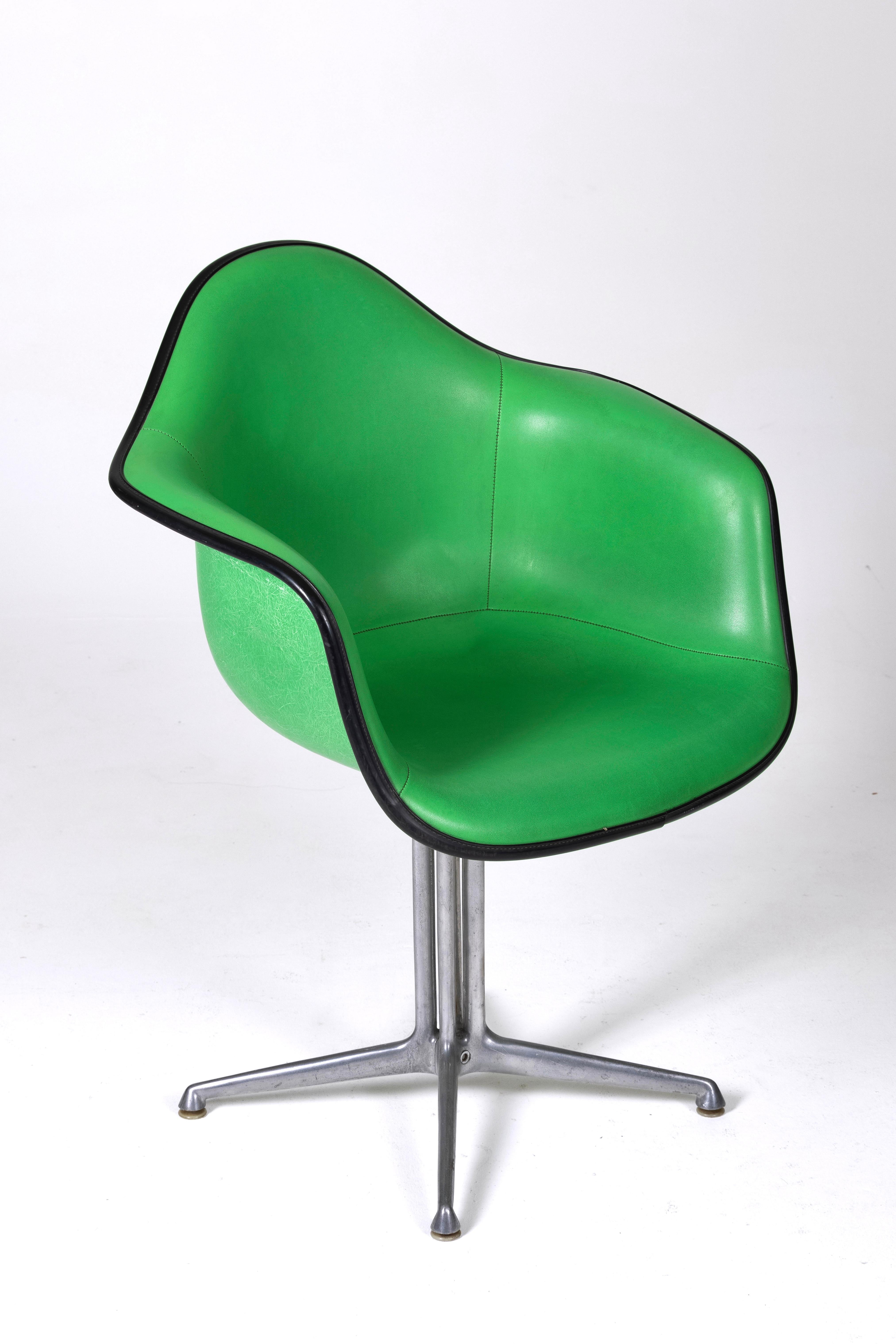 Charles and Ray Eames' Eames Plastic leather armchair. 4