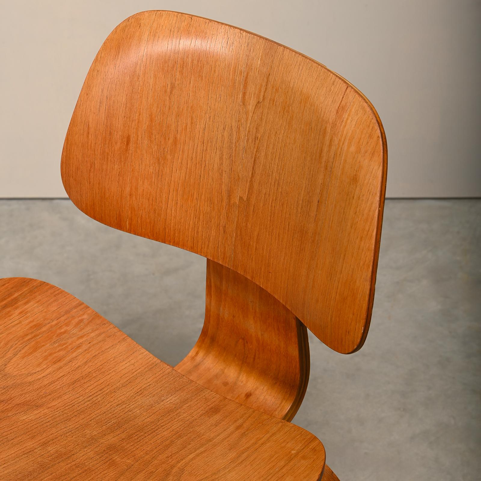Charles and Ray Eames Early DCW Walnut Plywood Dining Chairs for Herman Miller 6