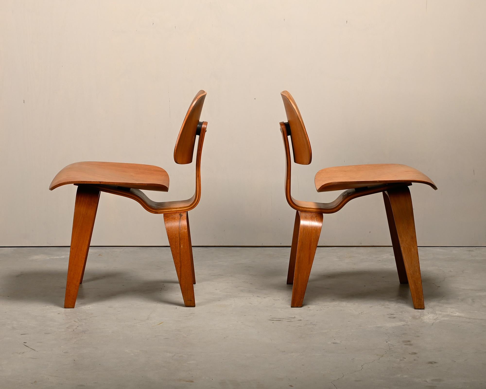 Molded Charles and Ray Eames Early DCW Walnut Plywood Dining Chairs for Herman Miller
