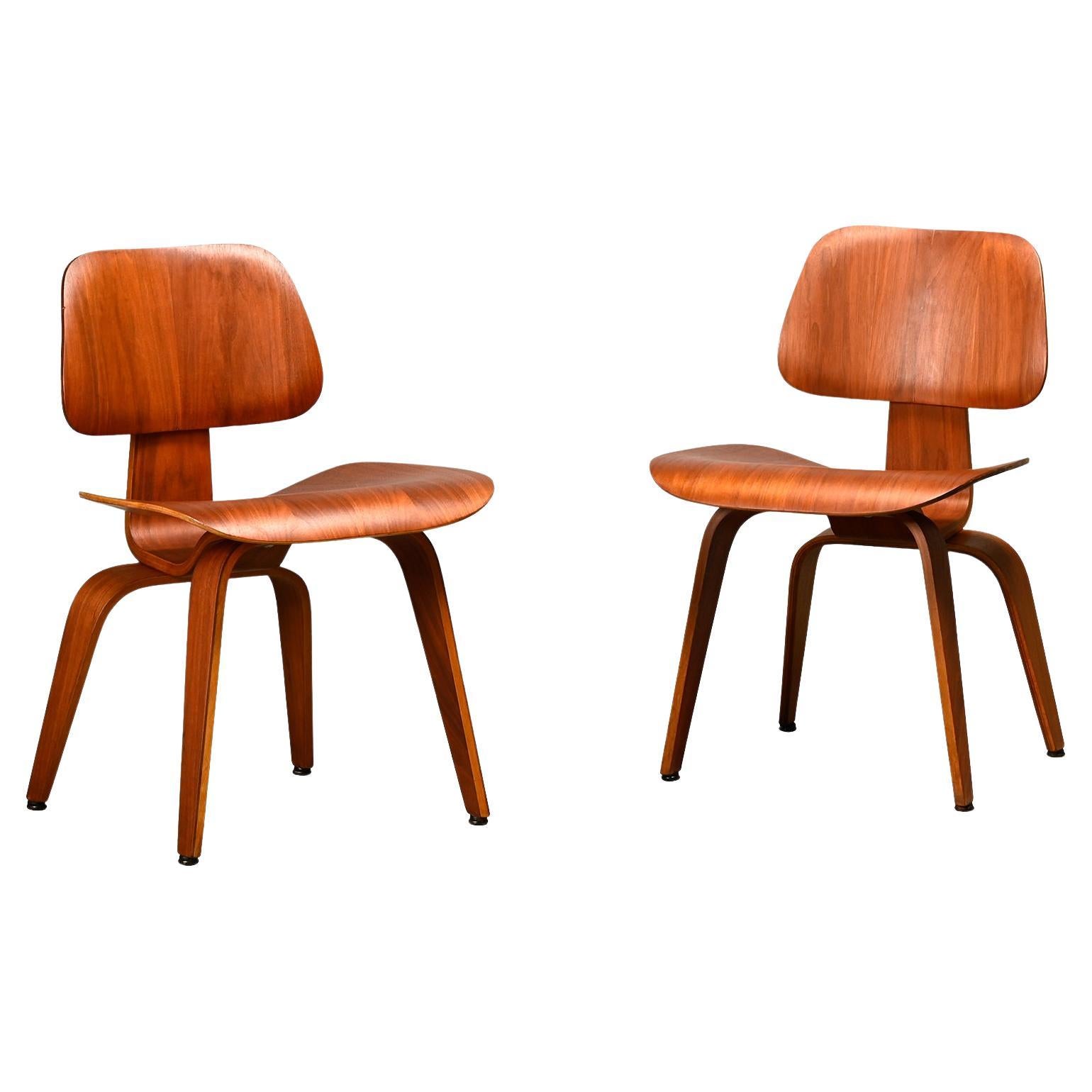 Charles and Ray Eames Early restored DCW Walnut Plywood Chairs, Herman Miller