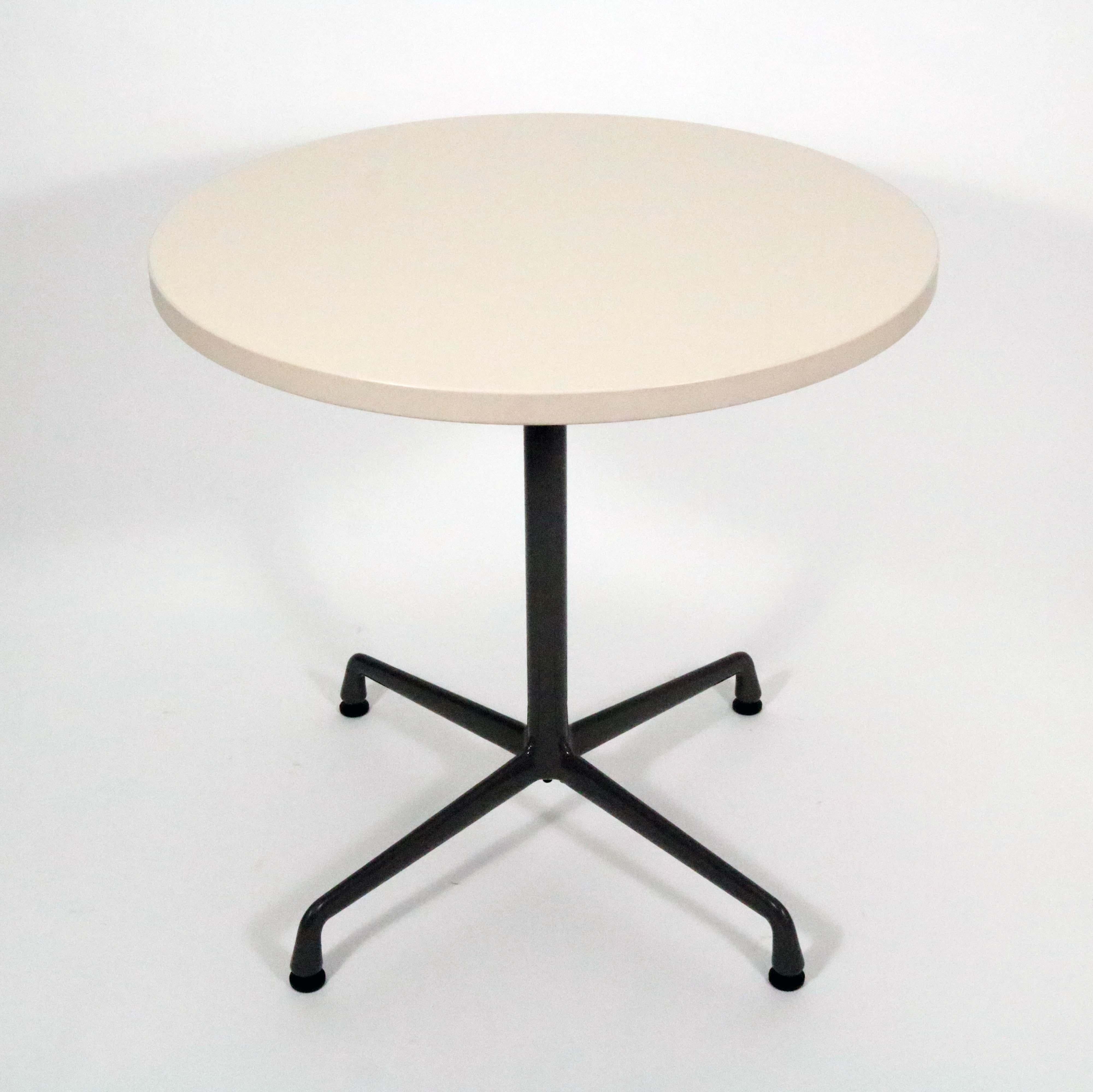 Charles and Ray Eames for Herman Miller Aluminum Group bistro table.

Four star base with laminate round top.