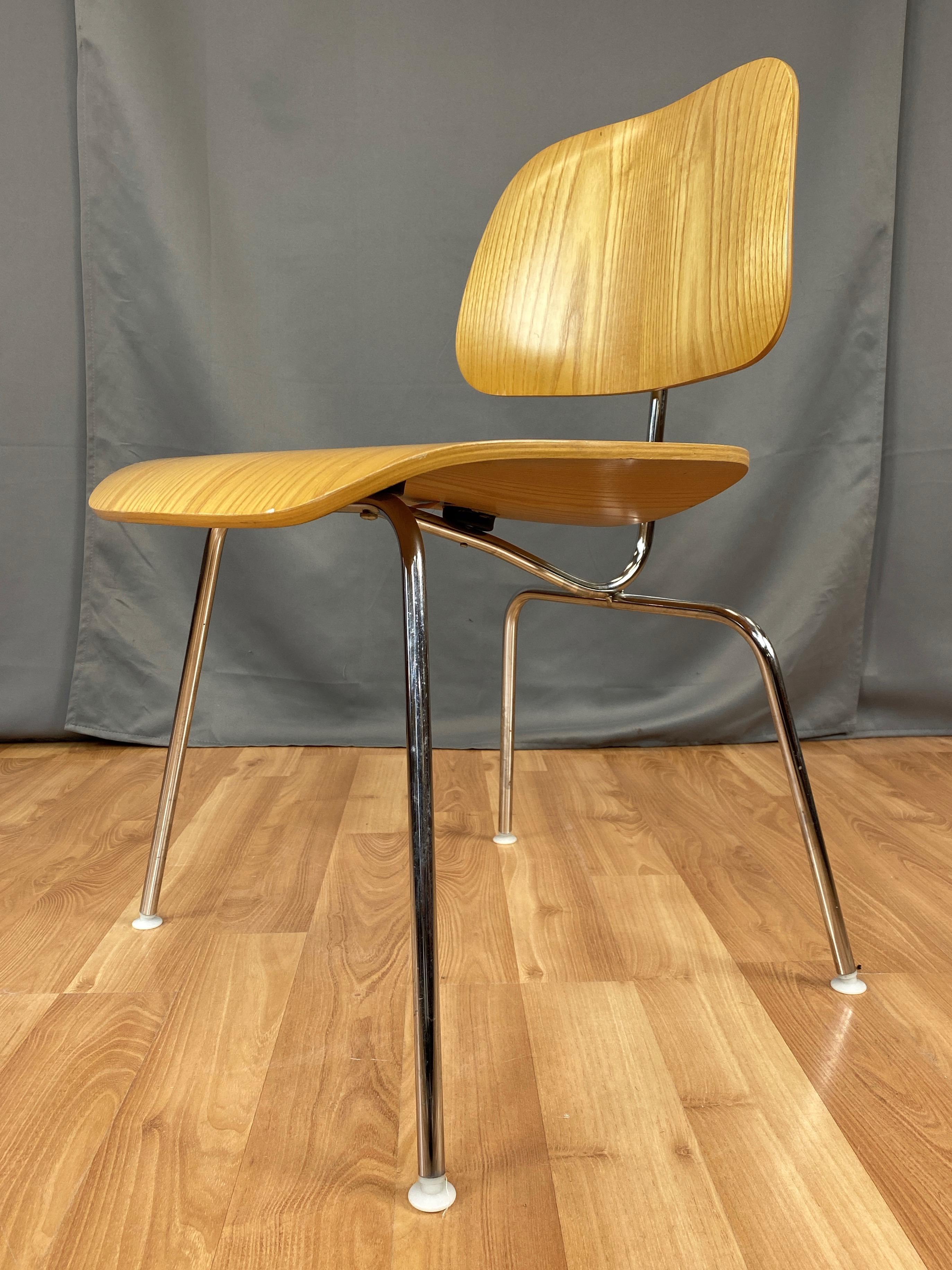 A DCM (Dining Chair Metal) in white ash by Charles and Ray Eames for Herman Miller.

Introduced in 1946, it quickly became a timeless and essential American design Classic. Molded five-ply seat and back on chromed-steel legs. This particular example