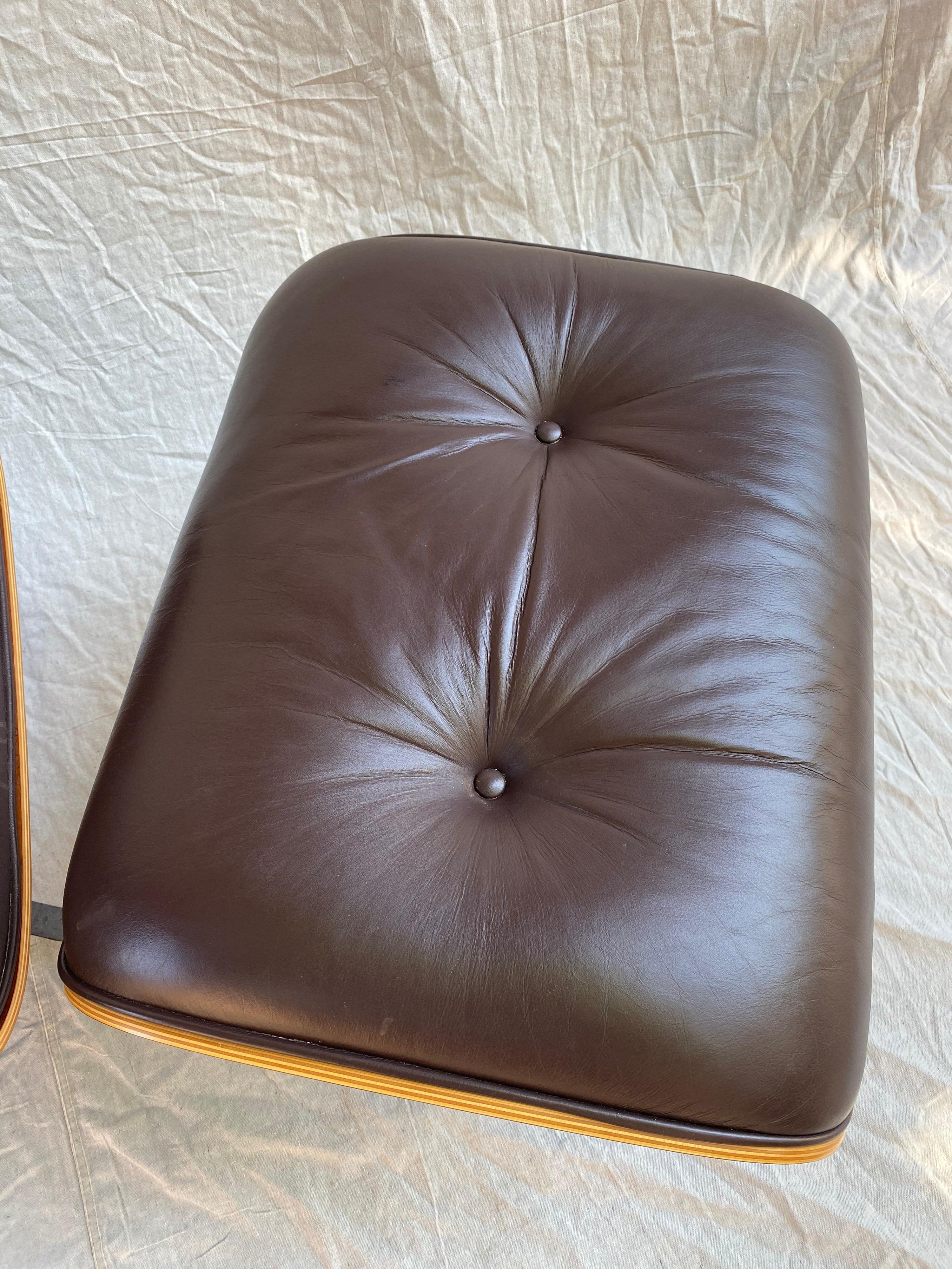 Late 20th Century Charles and Ray Eames for Herman Miller Cherry 670 Lounge Chair and Ottoman