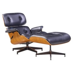 Charles and Ray Eames for Herman Miller Eames Walnut Lounge Chair with Ottoman