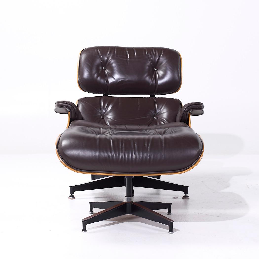 Charles and Ray Eames for Herman Miller Mid Century Eames Lounge Chair with Ottoman

The chair measures: 33.5 wide x 35 deep x 31.75 high, with a seat height of 17 inches and arm height/chair clearance of 20.75 inches
The ottoman measures: 26.25